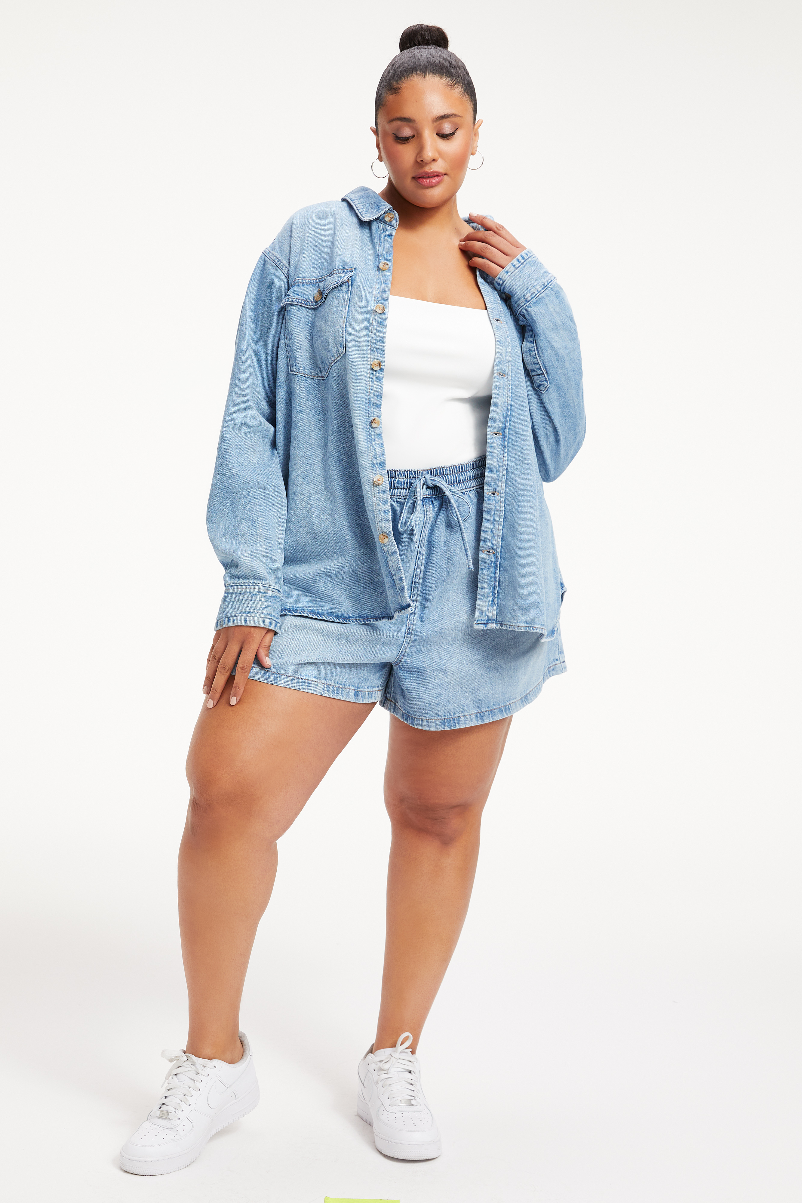 WEIGHTLESS DRAWSTRING SHORT in INDIGO210 styled with our RACERBACK TANK BODYSUIT in WHITE001, or WEIGHTLESS CROPPED BUTTON DOWN in INDIGO210