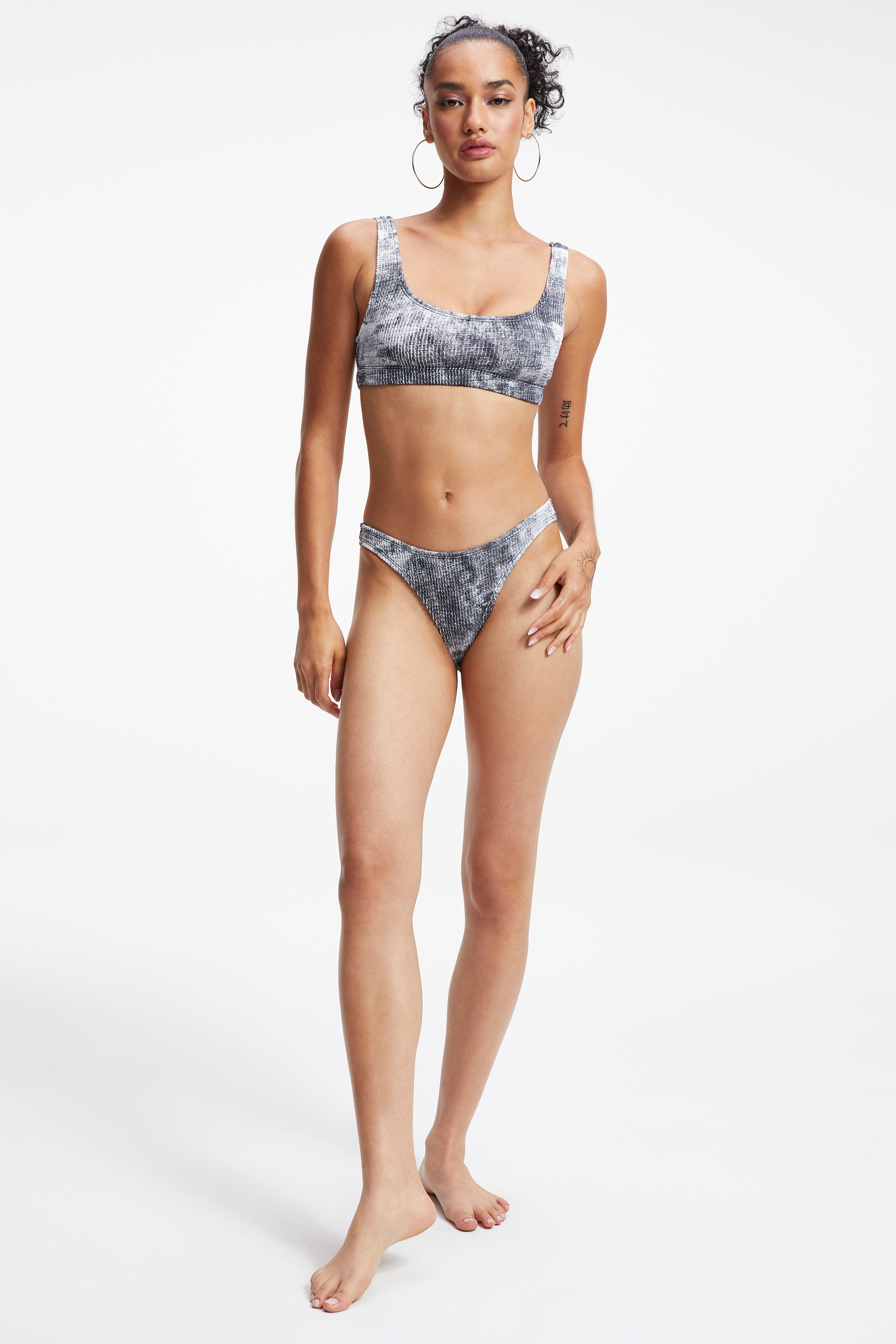 ALWAYS FITS SCOOP BIKINI TOP in GREY TIE DYE002 styled with our ALWAYS FITS BETTER BIKINI BOTTOM in GREY TIE DYE002, ALWAYS FITS GOOD WAIST CHEEKY BOTTOM in GREY TIE DYE002, or LEG DAZE SARONG in BLACK001