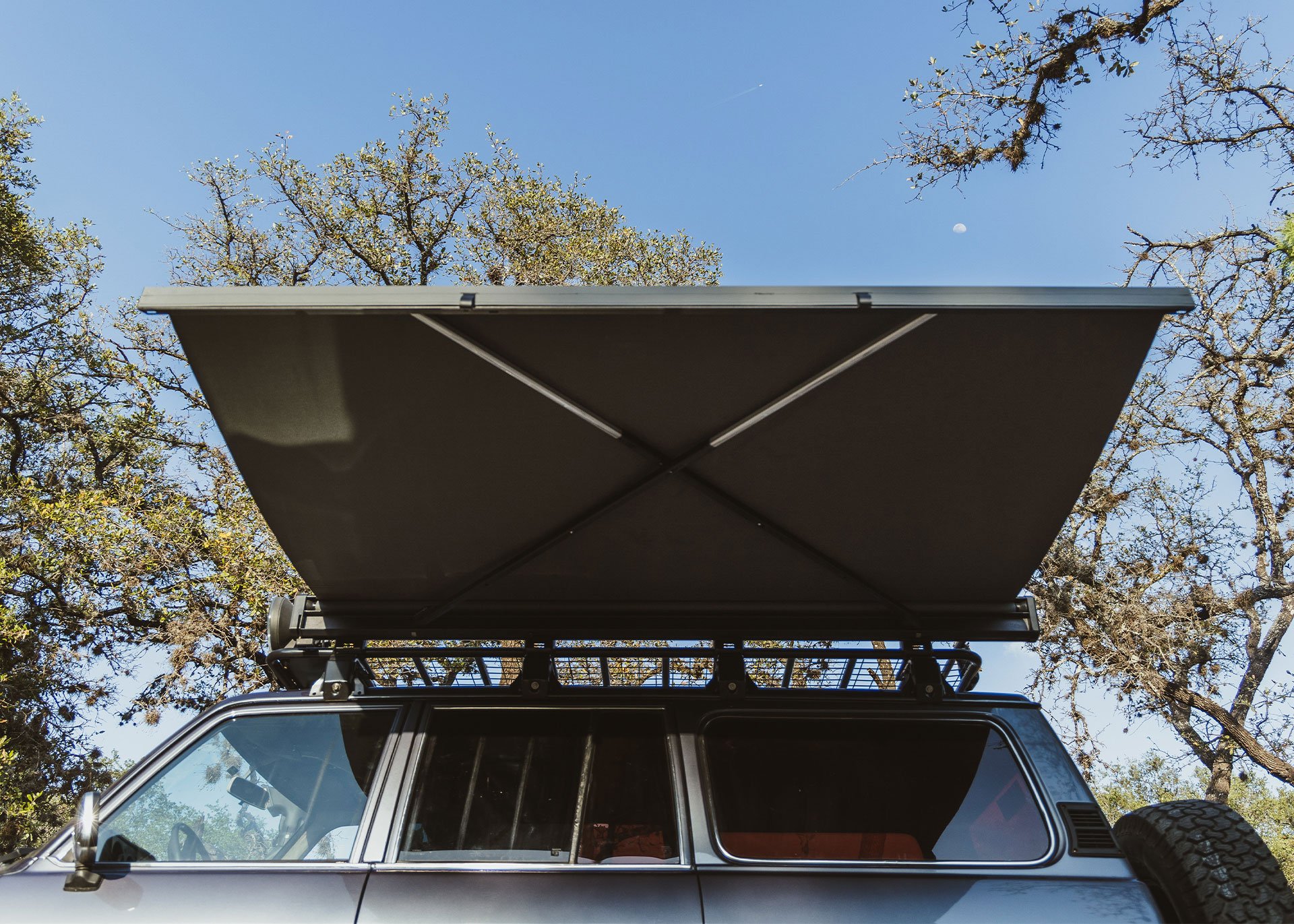 Seven foot Crosswing awning in Granit Gray deployed to 4.9 ft.