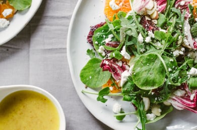 A green salad dressed with a vinaigrette made with Navitas Organics Superfood+ Sea Veggie Blend