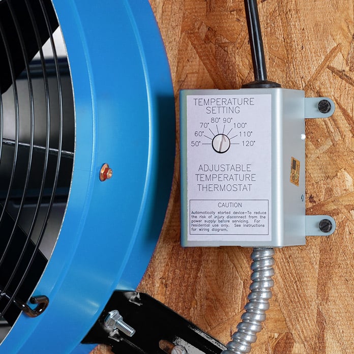 Close-up of the adjustable thermostat pre-wired to the attic fan.