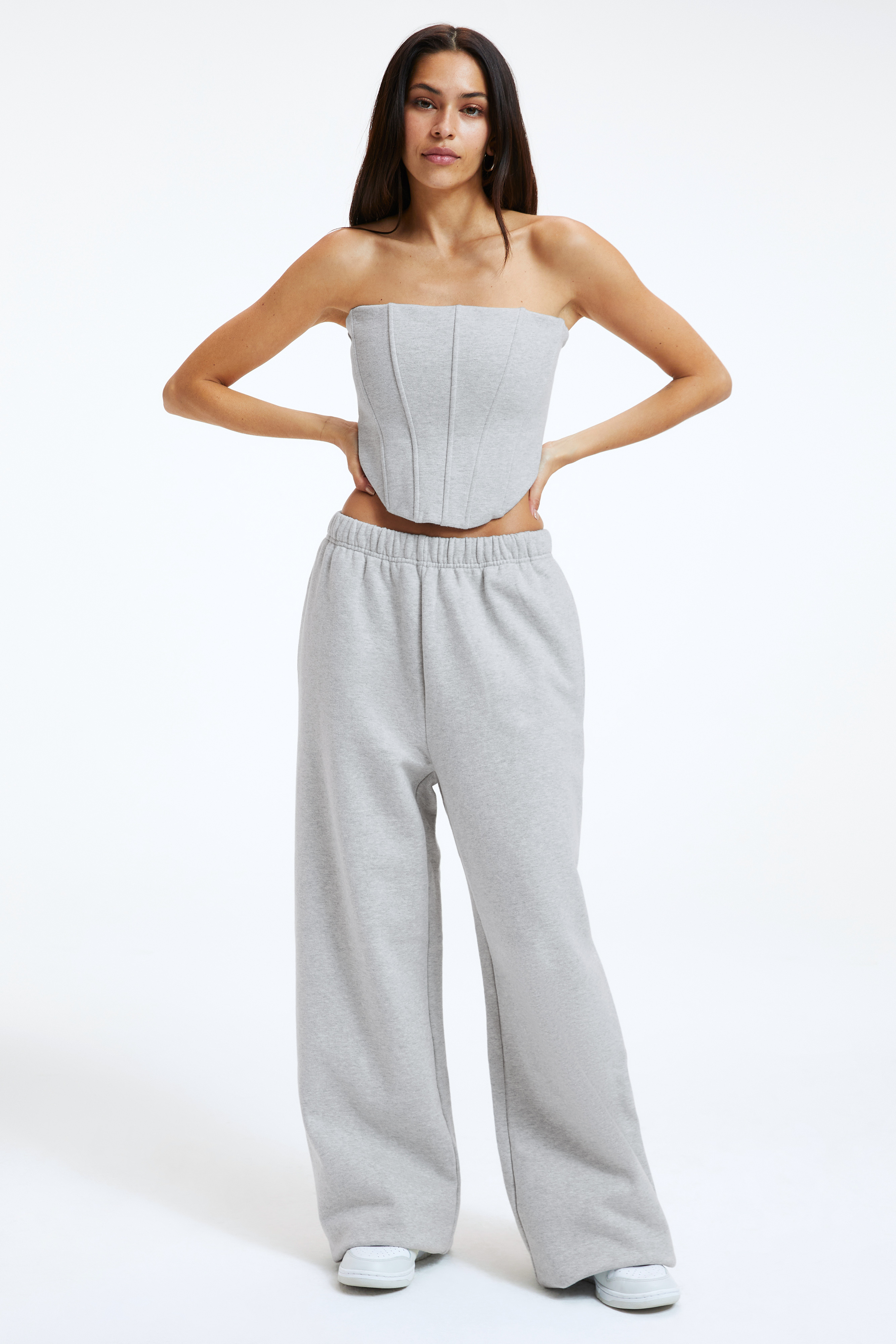 SUEDED FLEECE WIDE LEG SWEATPANT in HEATHER GREY001 styled with our SUEDED FLEECE CORSET TOP in HEATHER GREY001, CROPPED ZIP UP MOCK NECK in HEATHER GREY001, or FITTED SCOOP NECK TANK in WHITE001