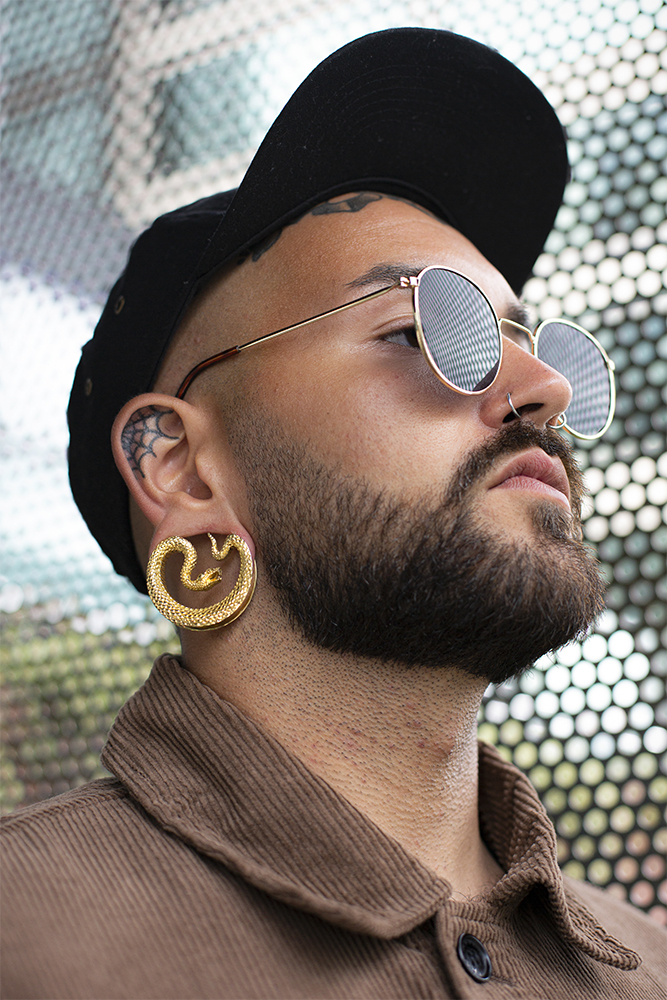 Guy wearing alternative  Gold Snake Saddle Metal Ear Gauge / Plug