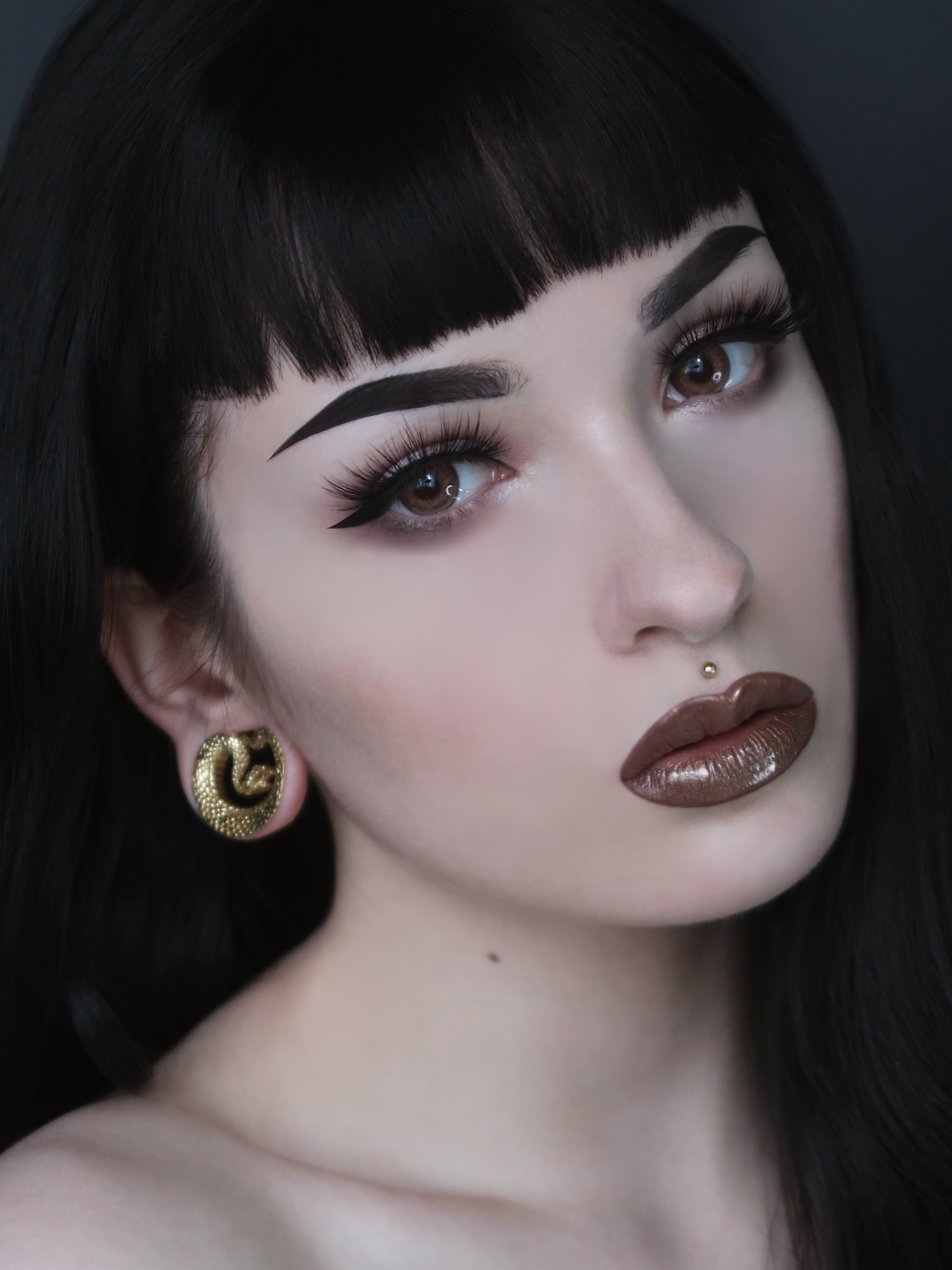 girl wearing goth  Gold Snake Saddle Metal Ear Gauge / Plug