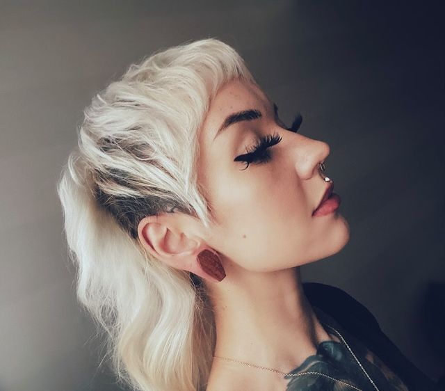 girl wearing spooky  Saba Coffin Wood Ear Plug / Gauge