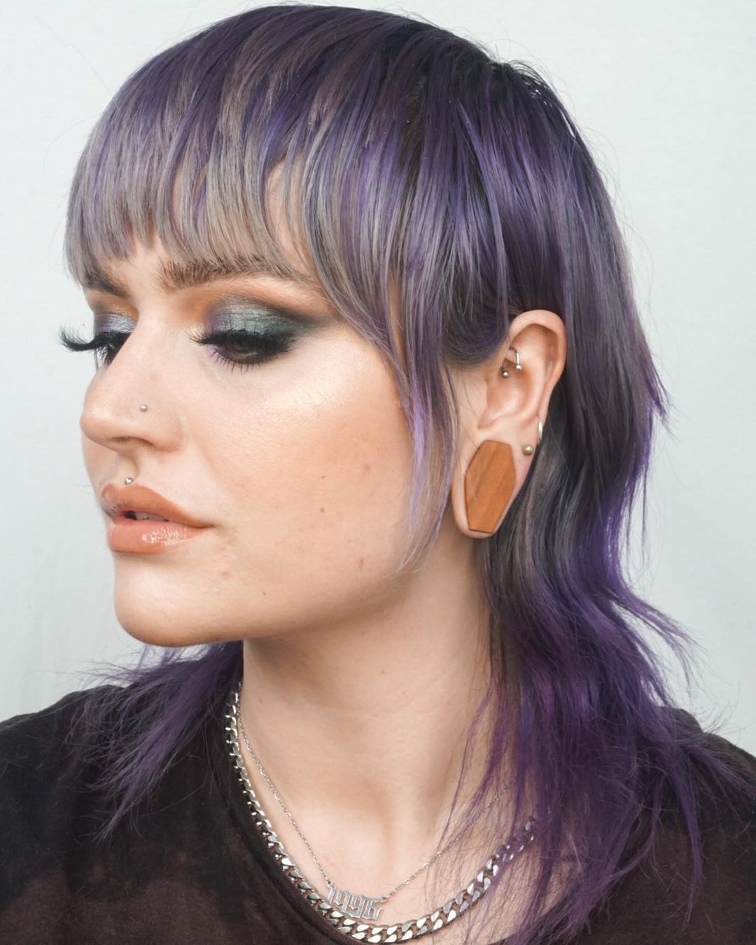 Women wearing big Saba Coffin Wood Ear Plug / Gauge