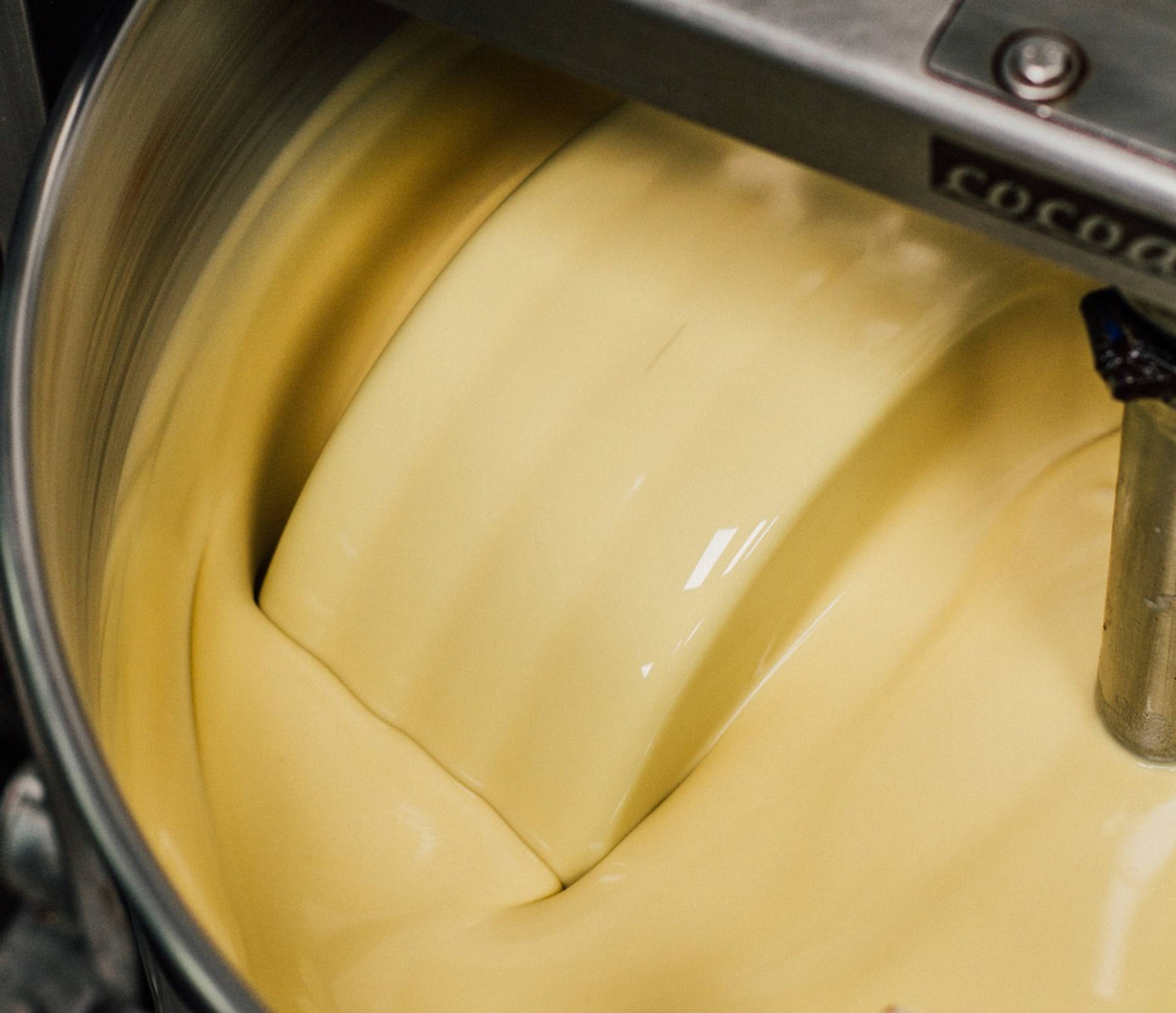 Sweet Corn vegan white chocolate in a grinder