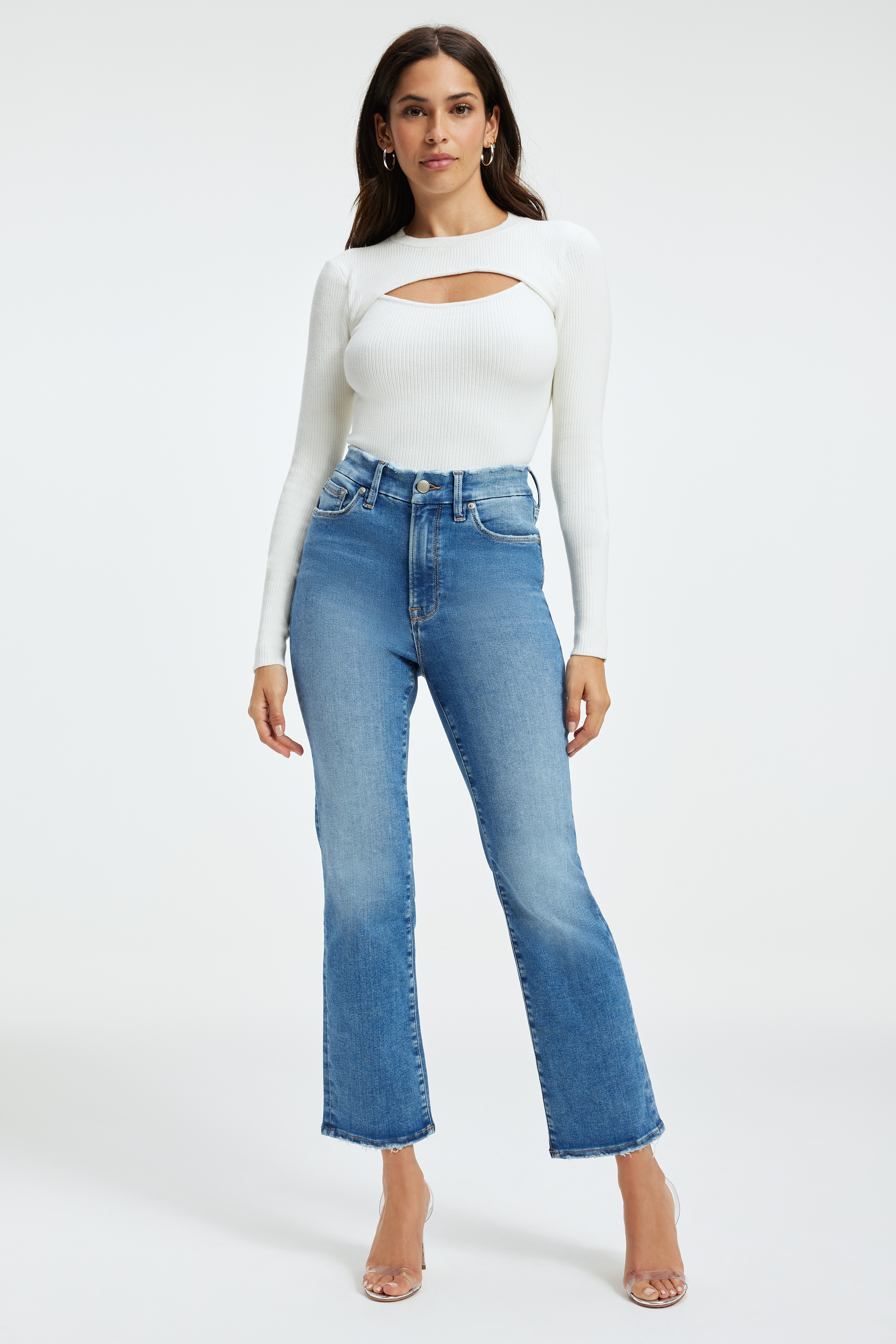 KNIT CUT-OUT TOP in IVORY001 styled with our GOOD LEGS CROPPED MINI BOOT JEANS in INDIGO350, GOOD CURVE STRAIGHT JEANS in BLUE313, or GOOD LEGS FLARE JEANS in INDIGO204