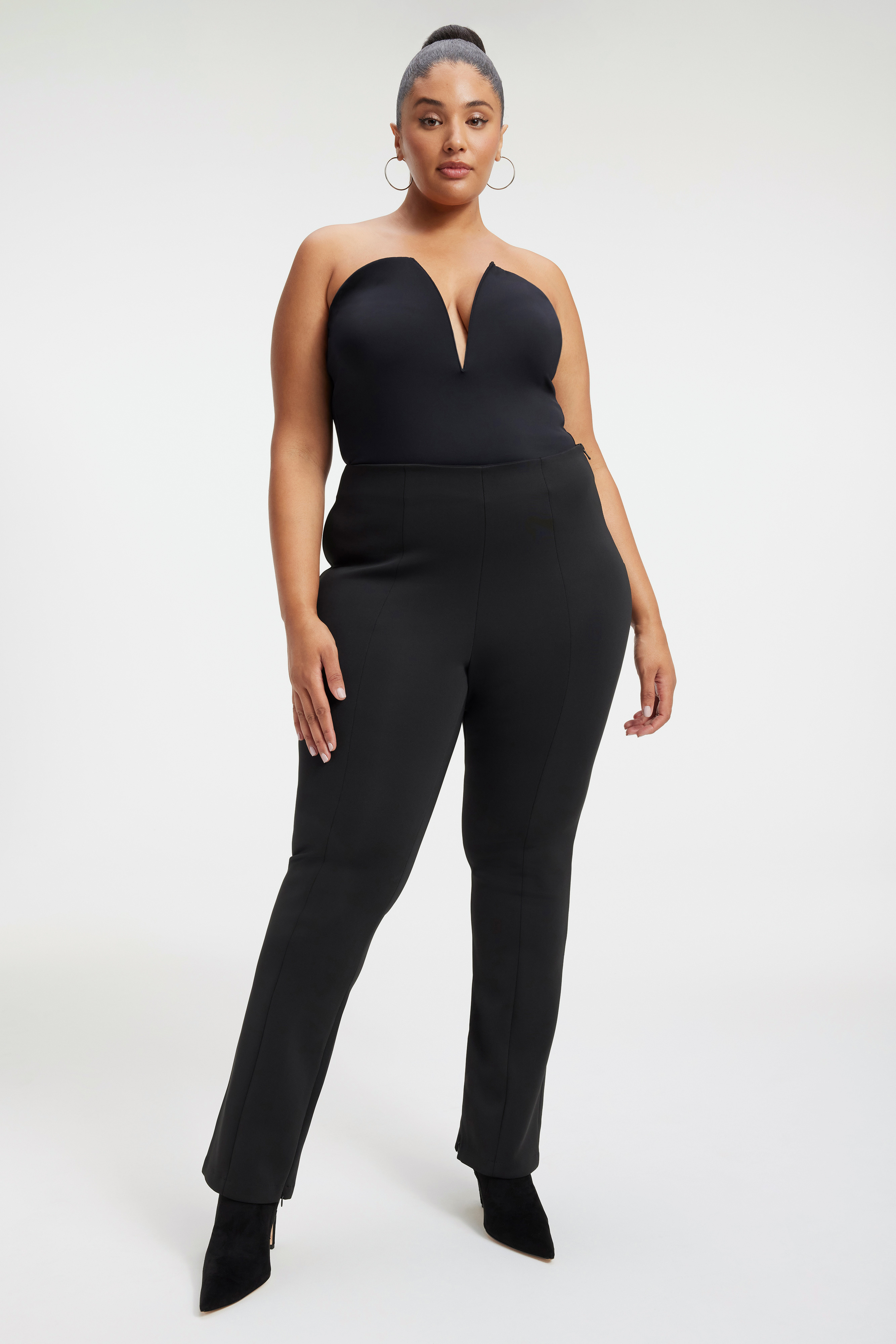 SCUBA V-NECK BODYSUIT in BLACK001 styled with our SCUBA SLIM FLARE PANT in BLACK001, SCUBA TROUSERS in BLACK001, or SHINY SCUBA PENCIL SKIRT in BLACK001