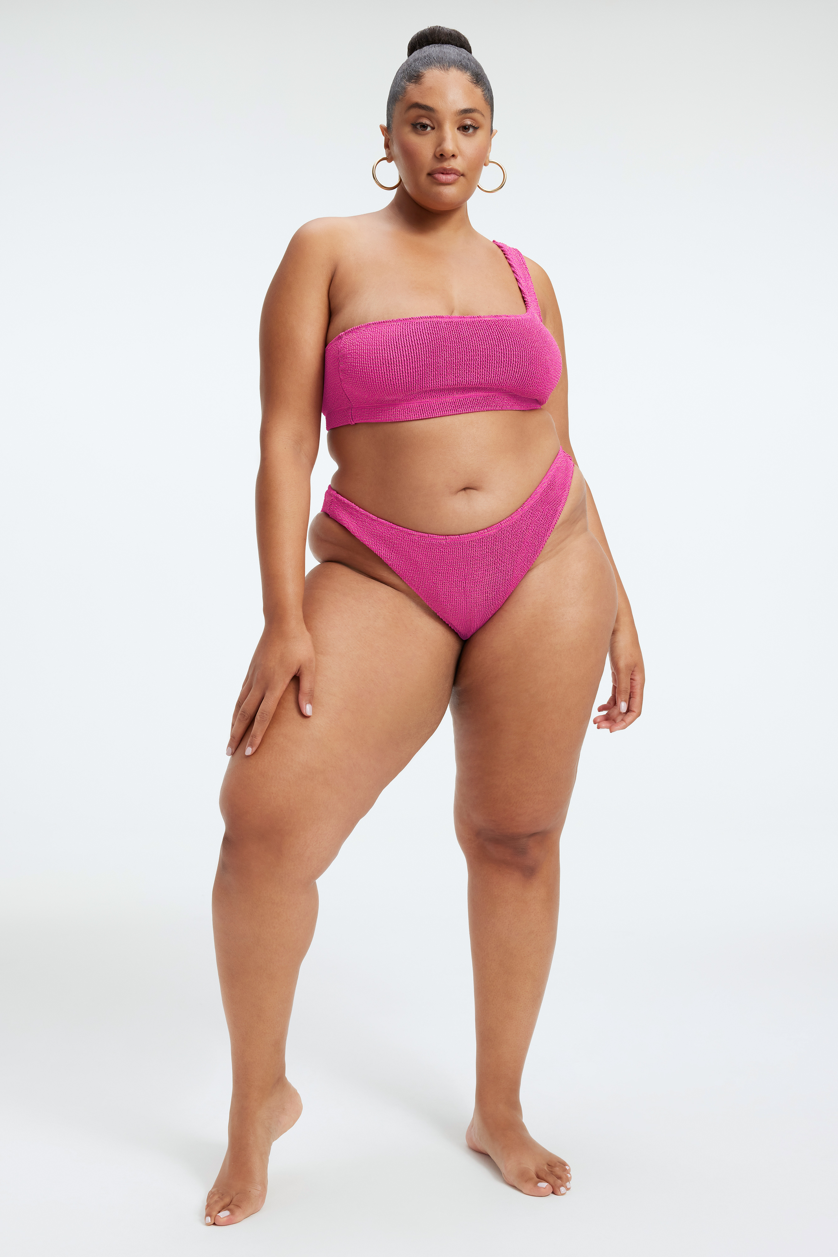 ALWAYS FITS METALLIC SHOULDER TOP in FUSCHIA PINK001 styled with our ALWAYS FITS METALLIC BIKINI BAND in FUSCHIA PINK001, ALWAYS FITS CHEEKY METALLIC BOTTOM in FUSCHIA PINK001, or ALWAYS FITS TINY METALLIC BOTTOM in FUSCHIA PINK001