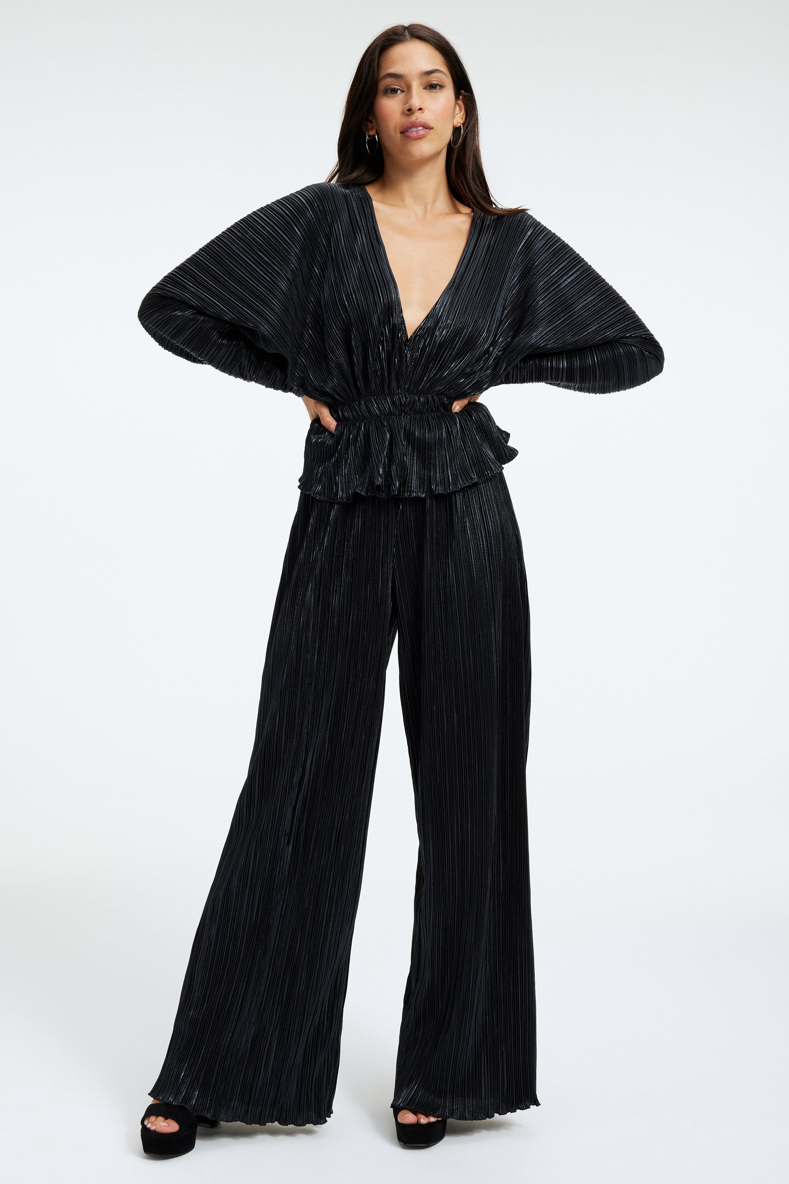 PLISSÉ DEEP V-NECK TOP in BLACK001 styled with our PLISSÉ PANT in BLACK001, PLISSÉ MIDI SKIRT in BLACK001, or CINDER-F*CKING-RELLA JEWELED MULE in BLACK SATIN001