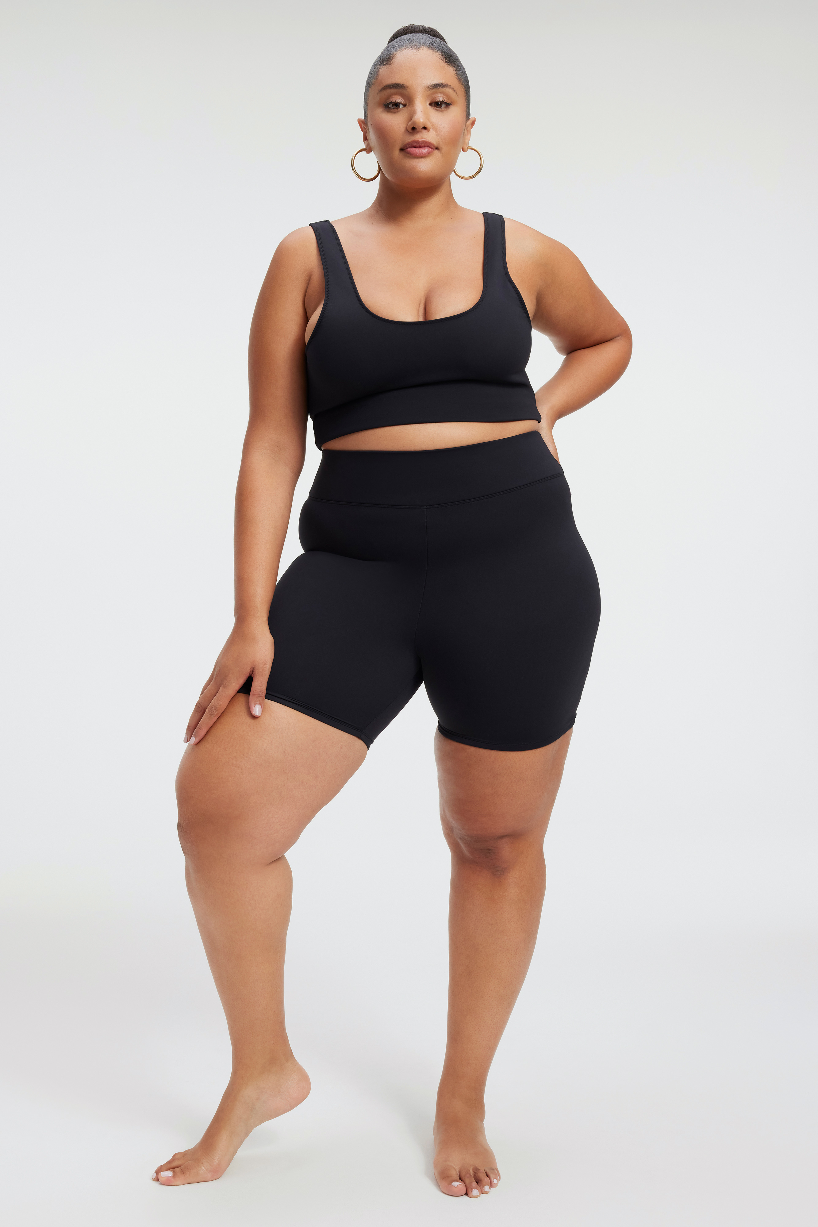 SCULPT BIKE SHORT in BLACK001 styled with our SCULPT SWIM TANK in BLACK001, SCULPT SWIM TEE in BLACK001,