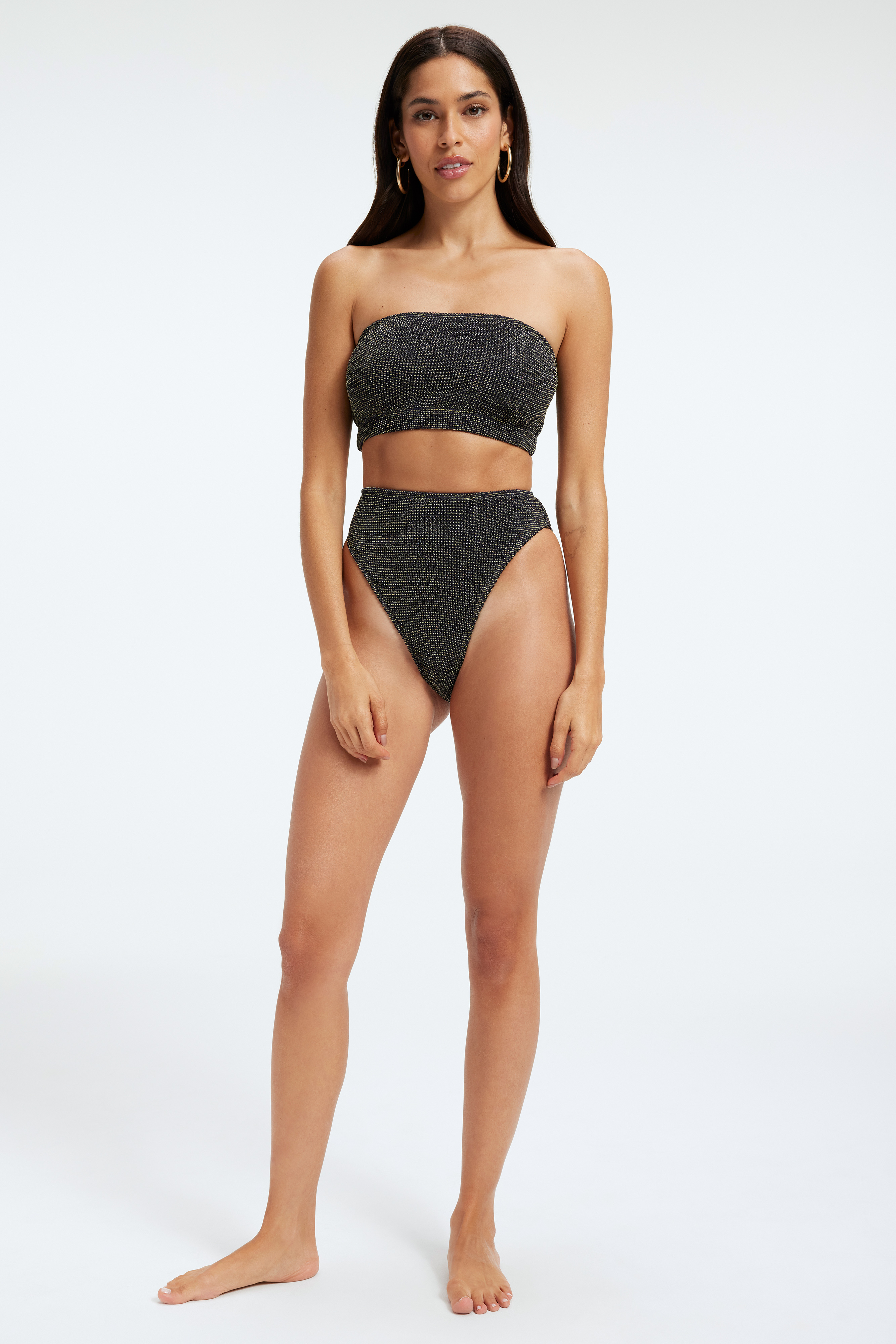 ALWAYS FITS CHEEKY METALLIC BOTTOM in BLACK001 styled with our ALWAYS FITS METALLIC BIKINI BAND in BLACK001, ALWAYS FITS METALLIC SCOOP TOP in BLACK001, or ALWAYS FITS TINY METALLIC TOP in BLACK001