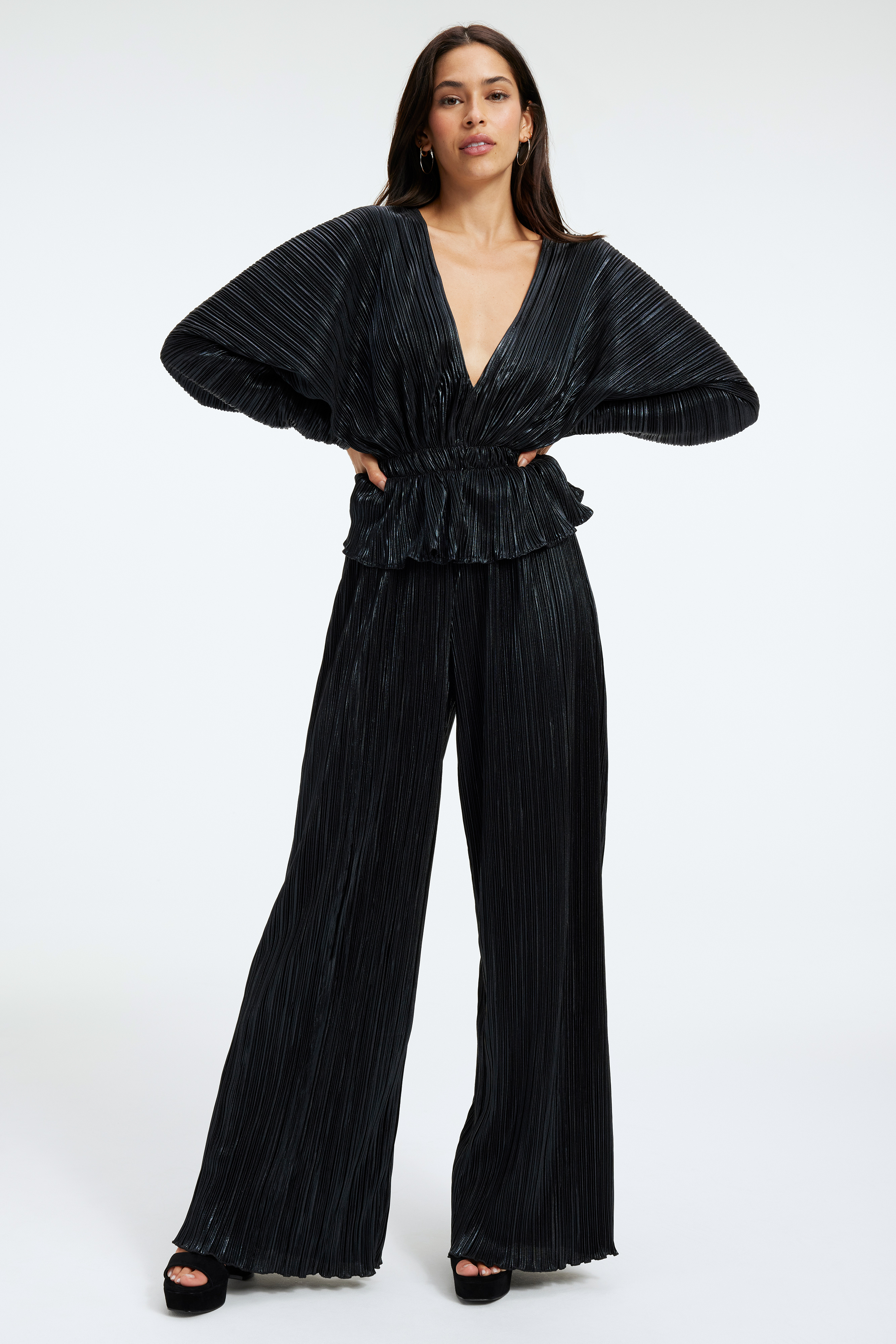 PLISSÉ PANT in BLACK001 styled with our PLISSÉ DEEP V-NECK TOP in BLACK001, SCULPTED BODYSUIT in BLACK001, or COTTON CROPPED TEE in BLACK001