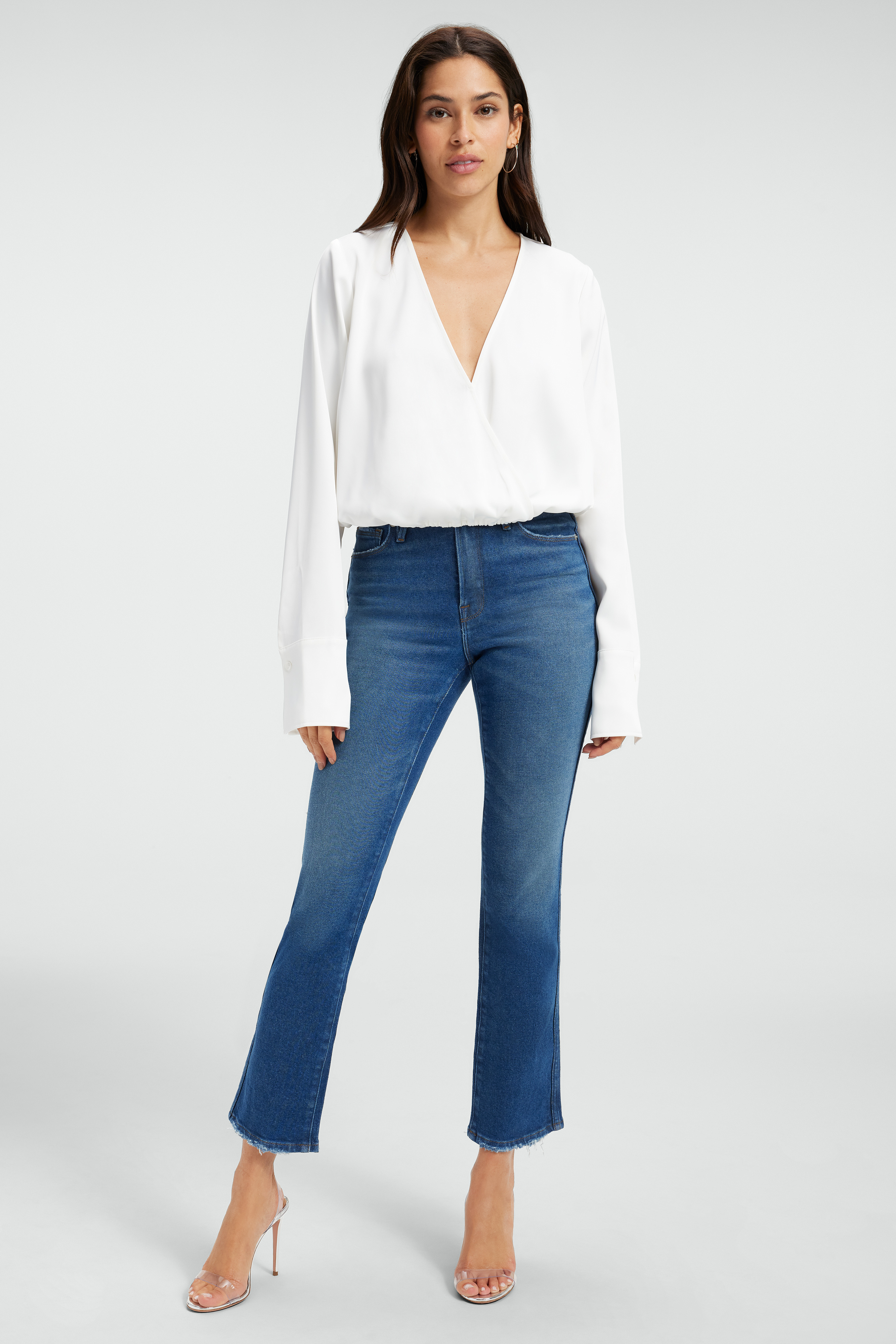 SATIN WRAP TOP in IVORY001 styled with our GOOD LEGS CROPPED MINI BOOT JEANS in BLUE811, GOOD LEGS JEANS in INDIGO236, or GOOD WAIST in INDIGO134