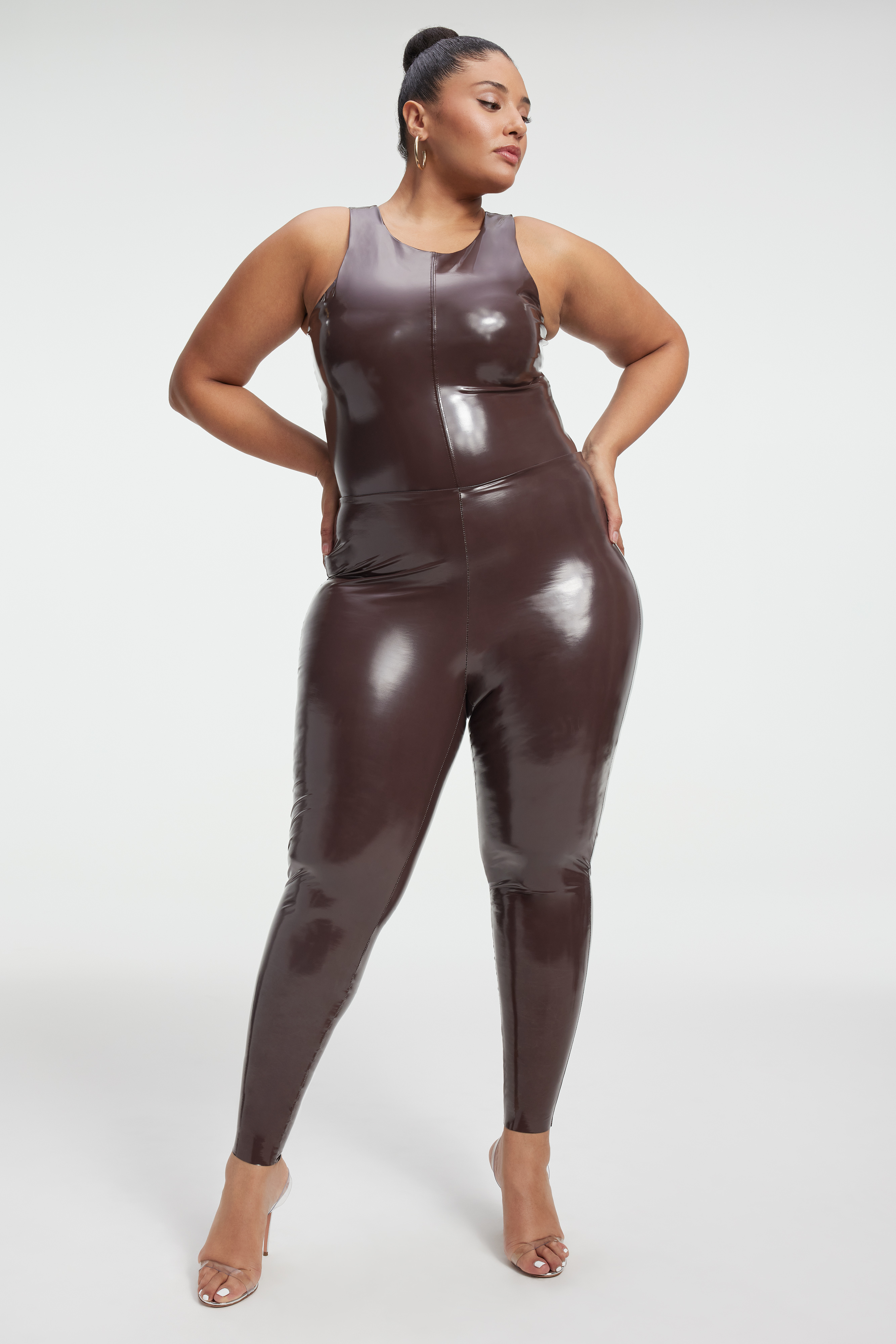 VINYL HIGH-NECK BODYSUIT in DARK COCOA001 styled with our VINYL LEGGINGS in DARK COCOA001, or VINYL FLARE LEGGINGS in DARK COCOA001