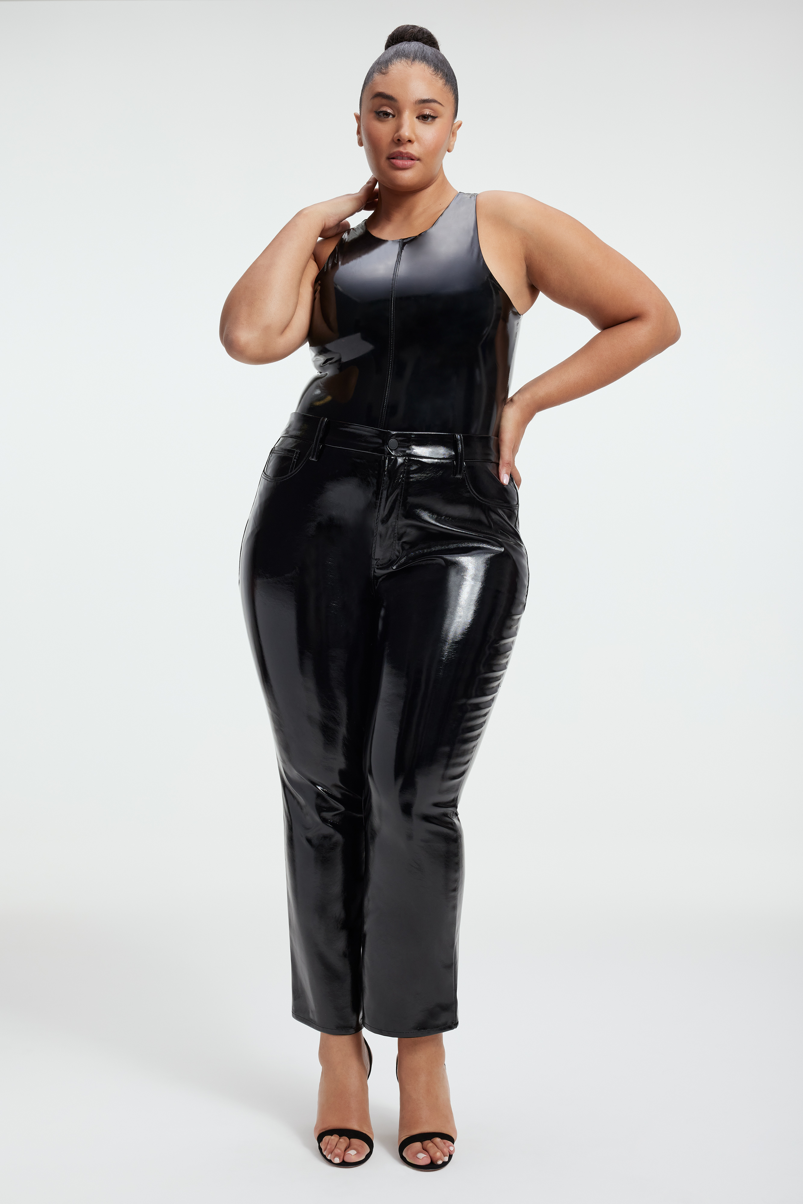VINYL HIGH-NECK BODYSUIT in BLACK001 styled with our GOOD CLASSIC FAUX LEATHER PANTS in BLACK001, VINYL LEGGINGS in BLACK001, or GOOD CLASSIC BOOT FAUX LEATHER PANTS in BLACK001
