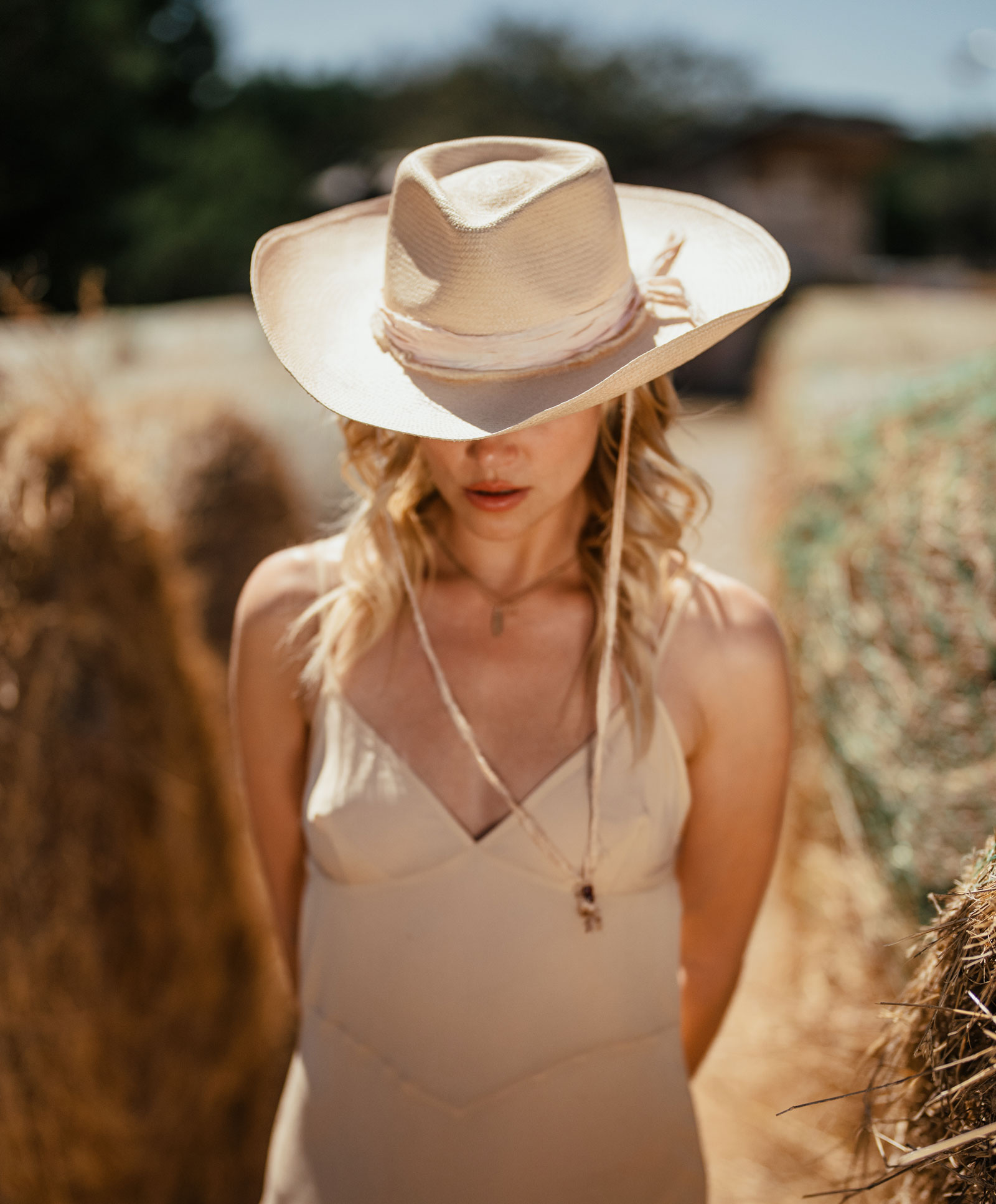 Design
Sun-kissed afternoons, late dinners at the ranch, take your Georgia Cowboy everywhere you go. 
Material
Handwoven Ecuadorian Straw 
Specifications
- Holding an elegant  4 1/4  teardrop crown- with a 4 turned brim - Adorned with tone on tone hand dyed silk dusty rose - And the bonus! The georgia comes with a hand dyed silk chin strap and a pair of venetia glass bids.- Handcrafted with Love in NYC 
 