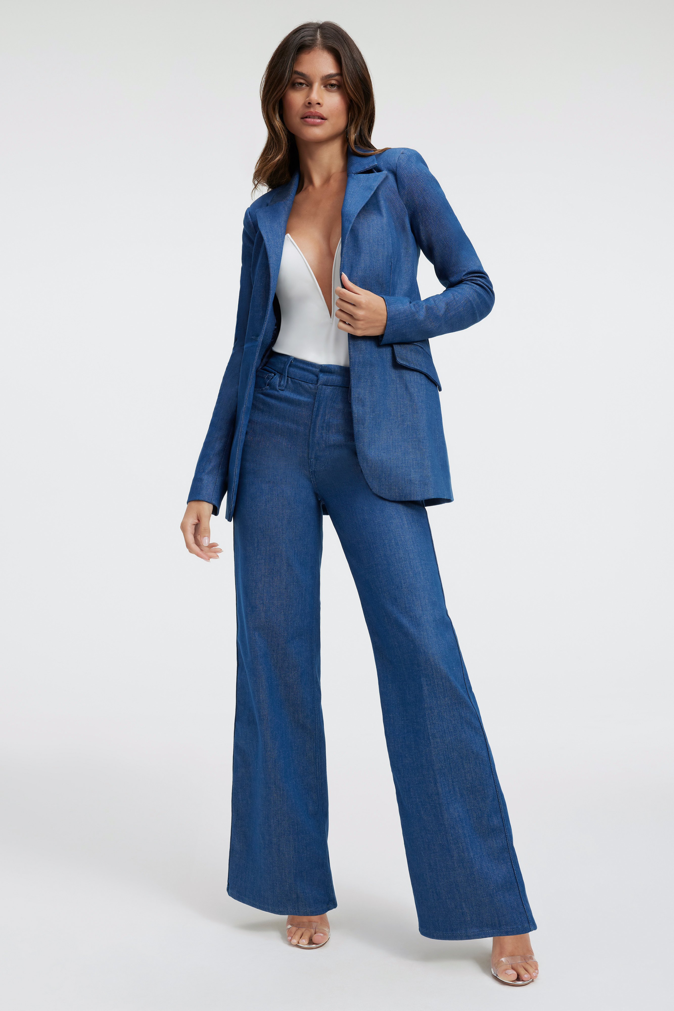 DENIM BLAZER in TRUEBLUE001 styled with our GOOD SKATE TROUSERS in TRUEBLUE001, U RING BODYSUIT in IVORY001, or DIAMONDS FOREVER HEEL in GLASS002