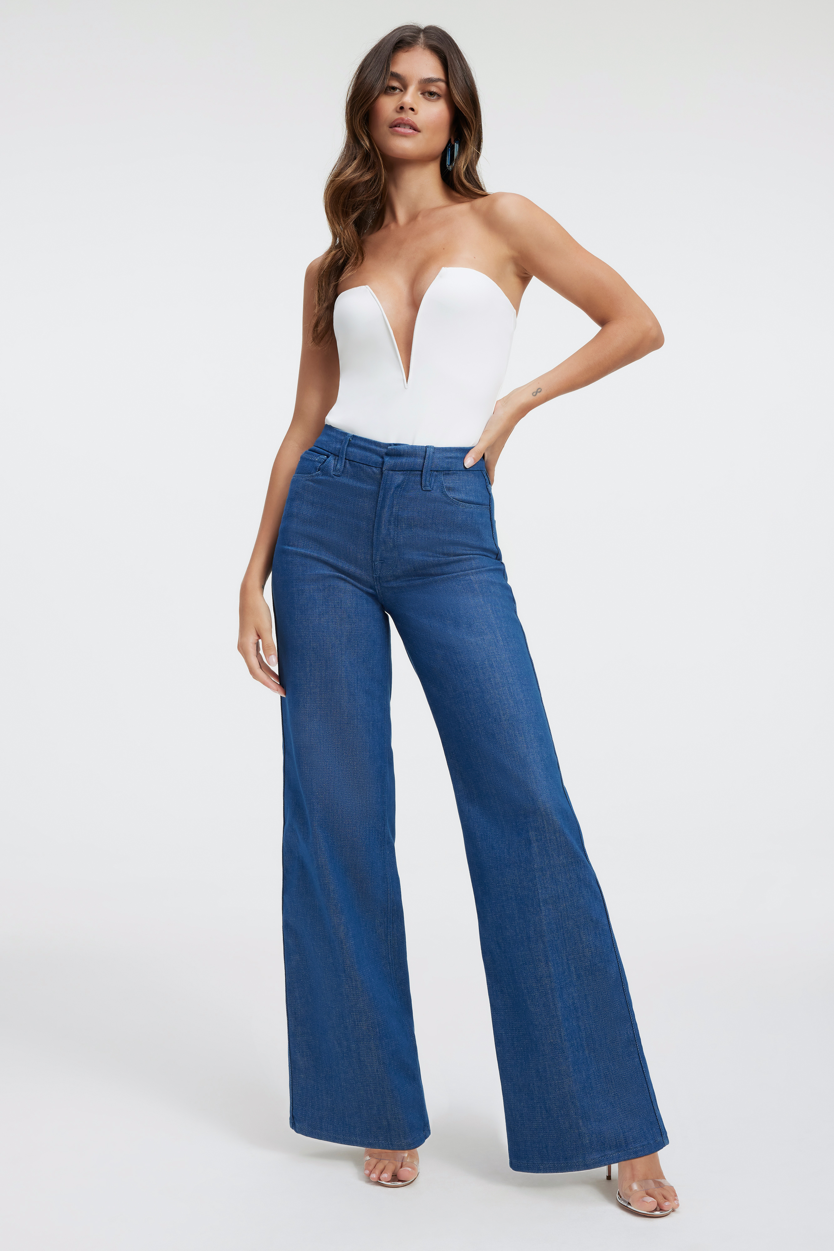 GOOD SKATE TROUSERS in TRUEBLUE001 styled with our U RING BODYSUIT in IVORY001, DENIM BLAZER in TRUEBLUE001, or DIAMONDS FOREVER HEEL in GLASS002