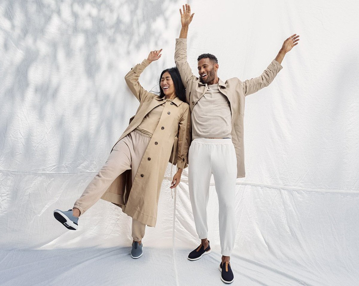 Man and woman standing with hands in the air wearing Swiftknit Loafer 
