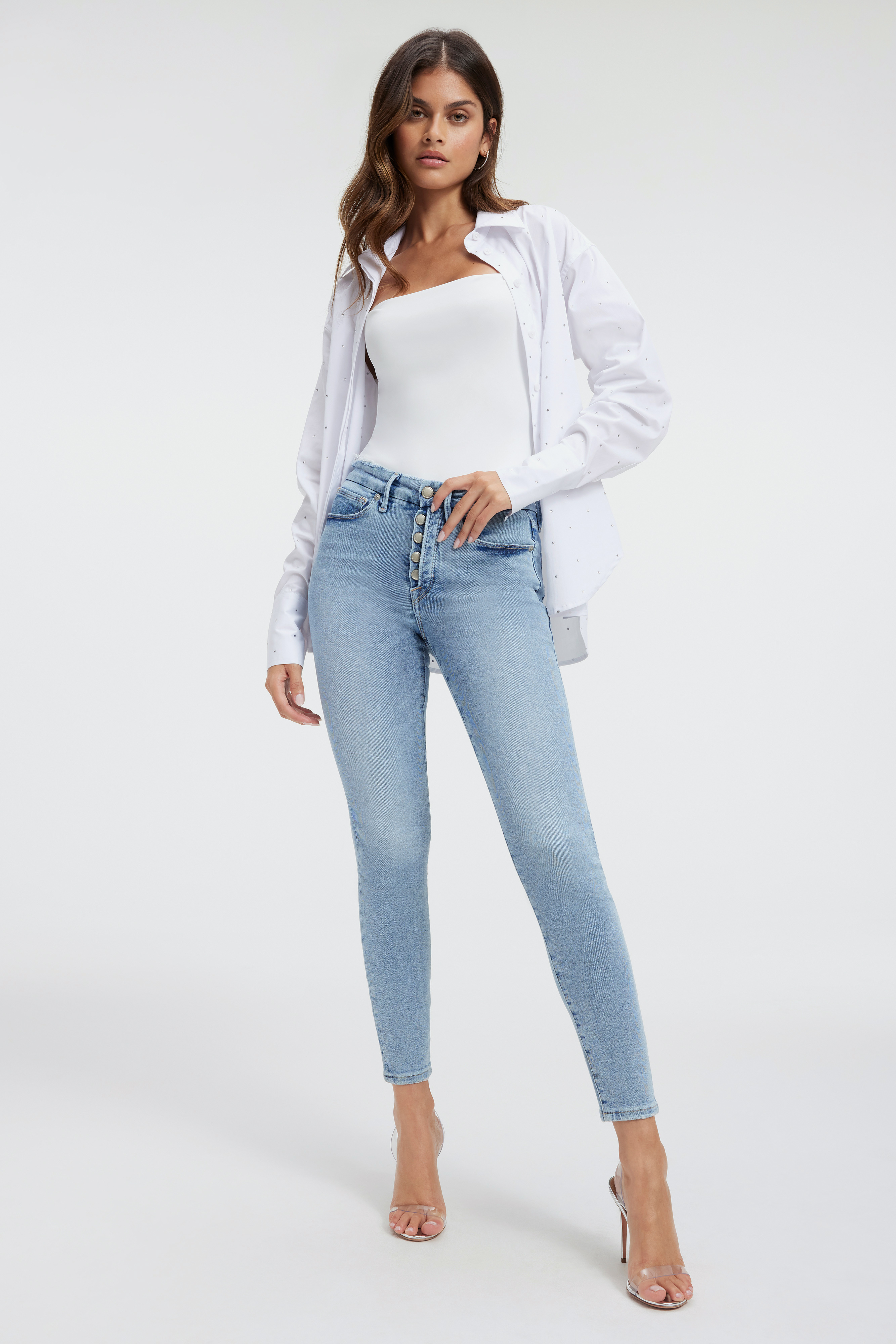 GOOD LEGS JEANS in INDIGO317 styled with our SCUBA MODERN TANK BODYSUIT in WHITE001, TABBED POPLIN SHIRT in WHITE001, or CRYSTAL GOOD SHIRT in WHITE001