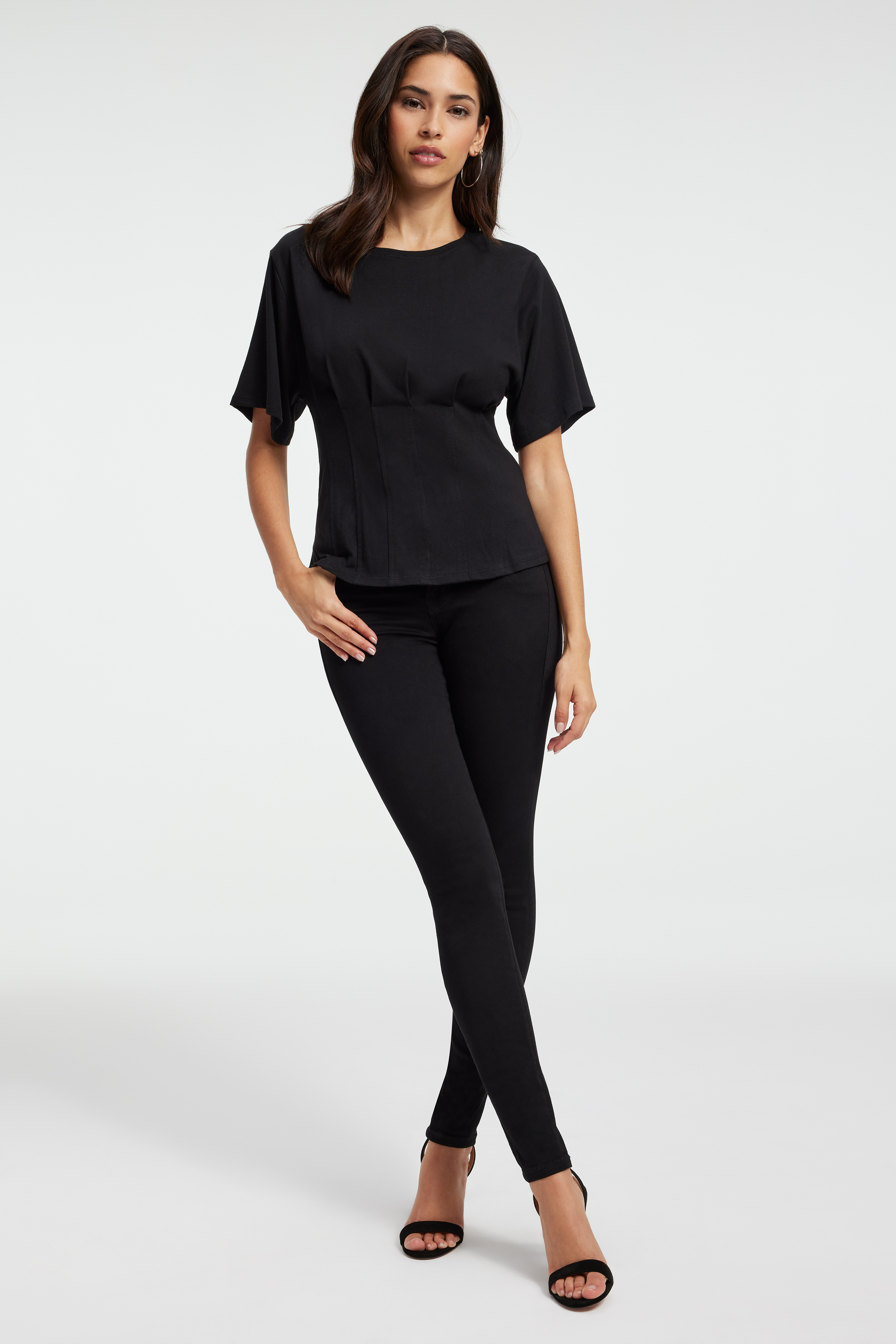 CORSET SHORT SLEEVE TEE in BLACK001 styled with our GOOD LEGS in BLACK001, GOOD WAIST CROP JEANS in BLACK216, or GOOD LEGS STRAIGHT JEANS in BLACK302