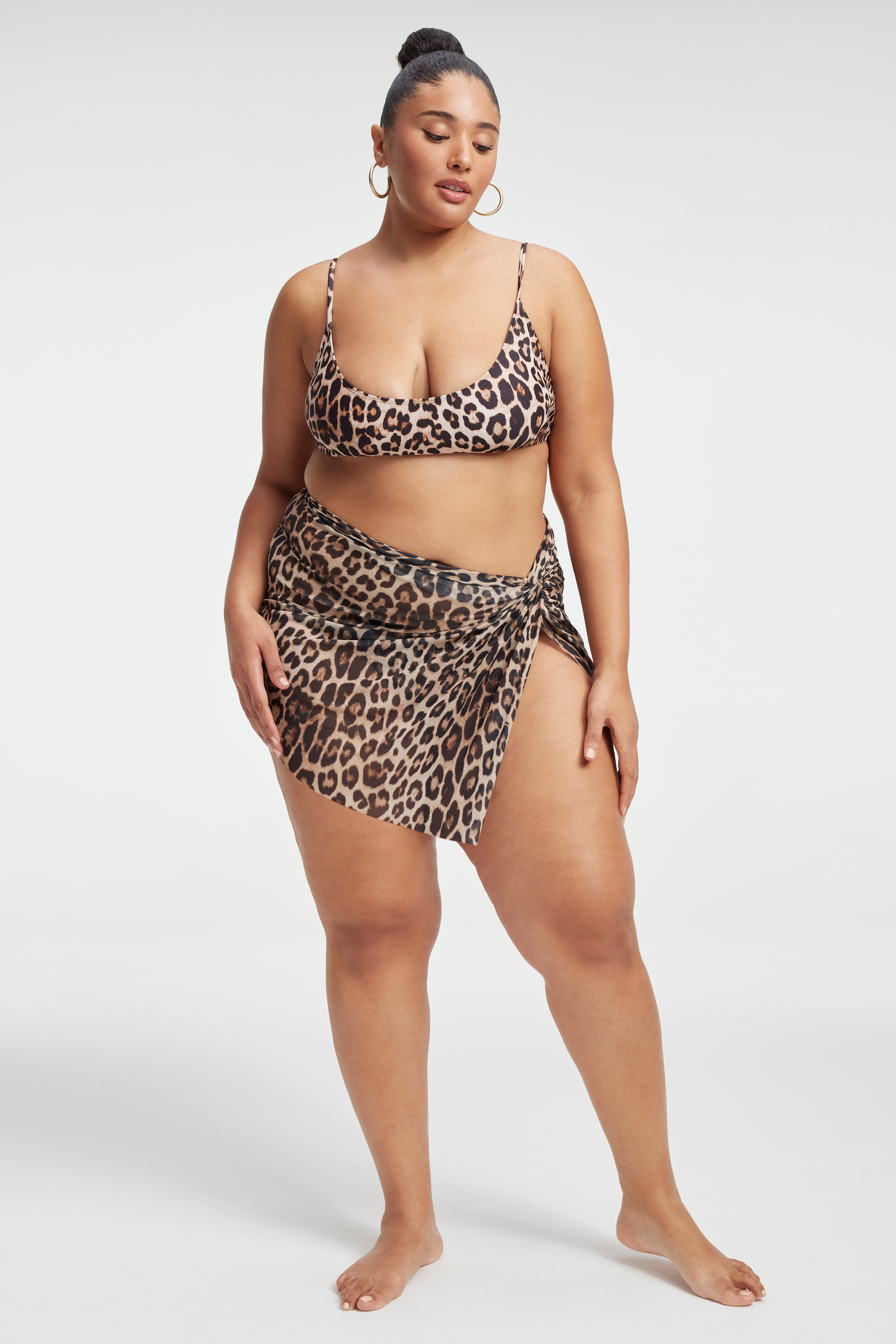 MESH TWIST MINI SARONG in GOOD LEOPARD003 styled with our DEEP SCOOP BIKINI TOP in GOOD LEOPARD003, PERFECT FIT BIKINI TOP in GOOD LEOPARD003, or REVERSIBLE GOOD WAIST CHEEKY BOTTOM in LEOPARDREVERSE001
