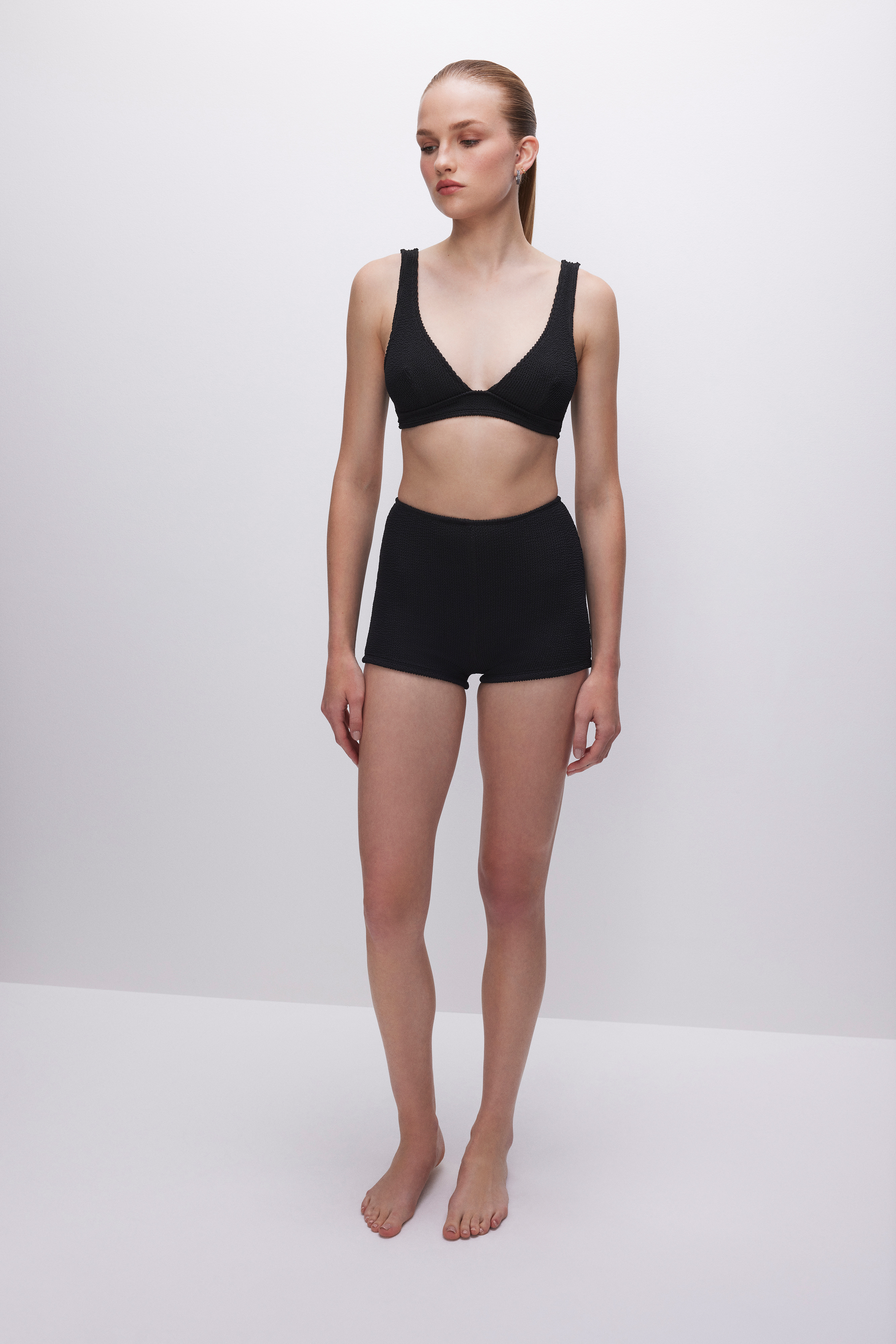 ALWAYS FITS BOY SWIM SHORTS in BLACK001 styled with our ALWAYS FITS SUPPORT BIKINI TOP in BLACK001, ALWAYS FITS SCOOP BIKNI TOP in BLACK001, or ALWAYS FITS PERFECT FIT BIKINI TOP in BLACK001