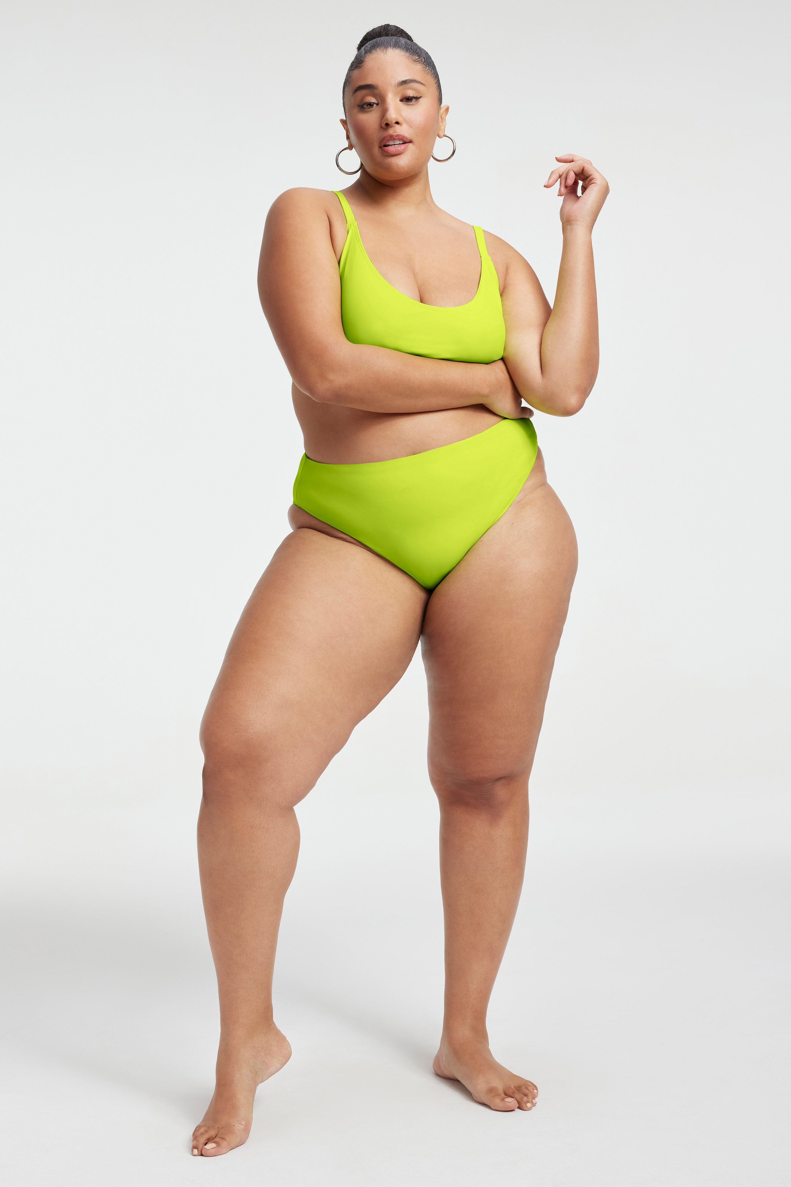 GOOD WAIST CHEEKY BIKINI BOTTOM in ELECTRIC LIME002 styled with our DEEP SCOOP BIKINI TOP in ELECTRIC LIME002, PERFECT FIT BIKINI TOP in ELECTRIC LIME002, or CROPPED SWIM TEE in ELECTRIC LIME002
