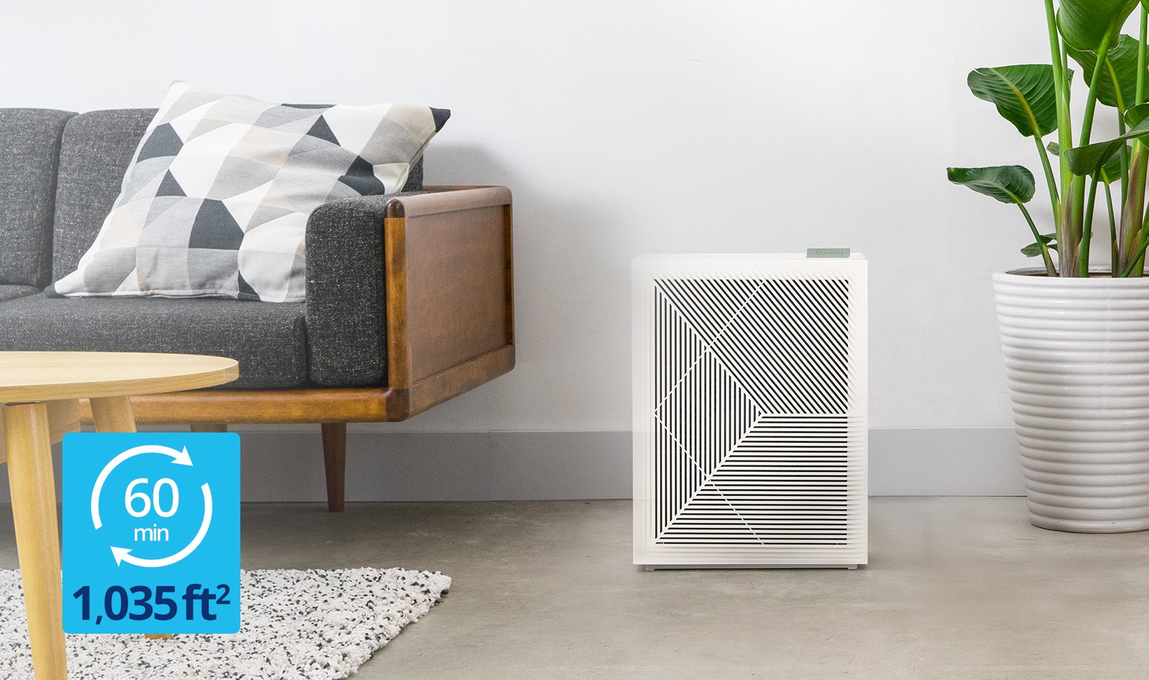 Coway Airmega 160 Dove White in living room, purifies up to 1.035 sq feet in 60 minutes