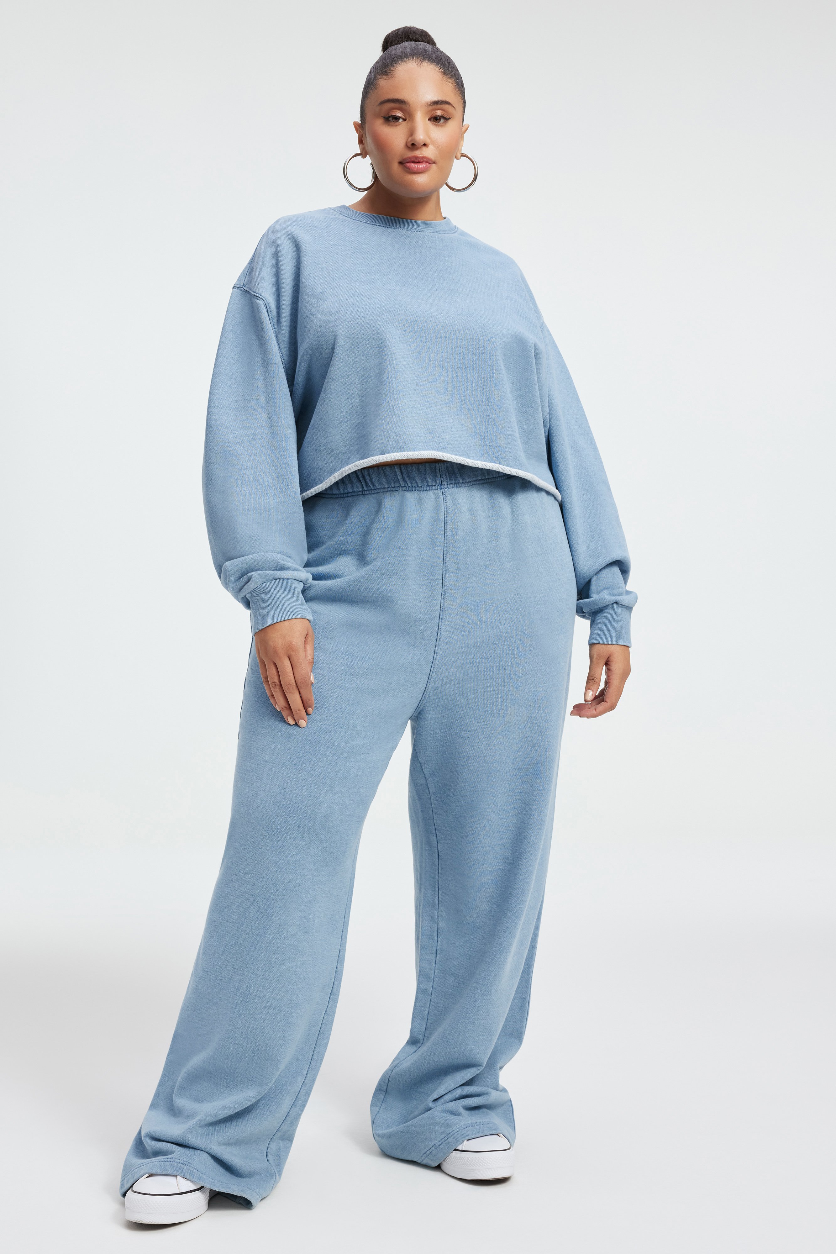 JEANIUS CROPPED SWEATSHIRT in INDIGO376 styled with our JEANIUS WIDE LEG SWEATPANTS in INDIGO376, JEANIUS SWEATPANTS in INDIGO376, or GOOD CLASSIC JEANS in INDIGO352