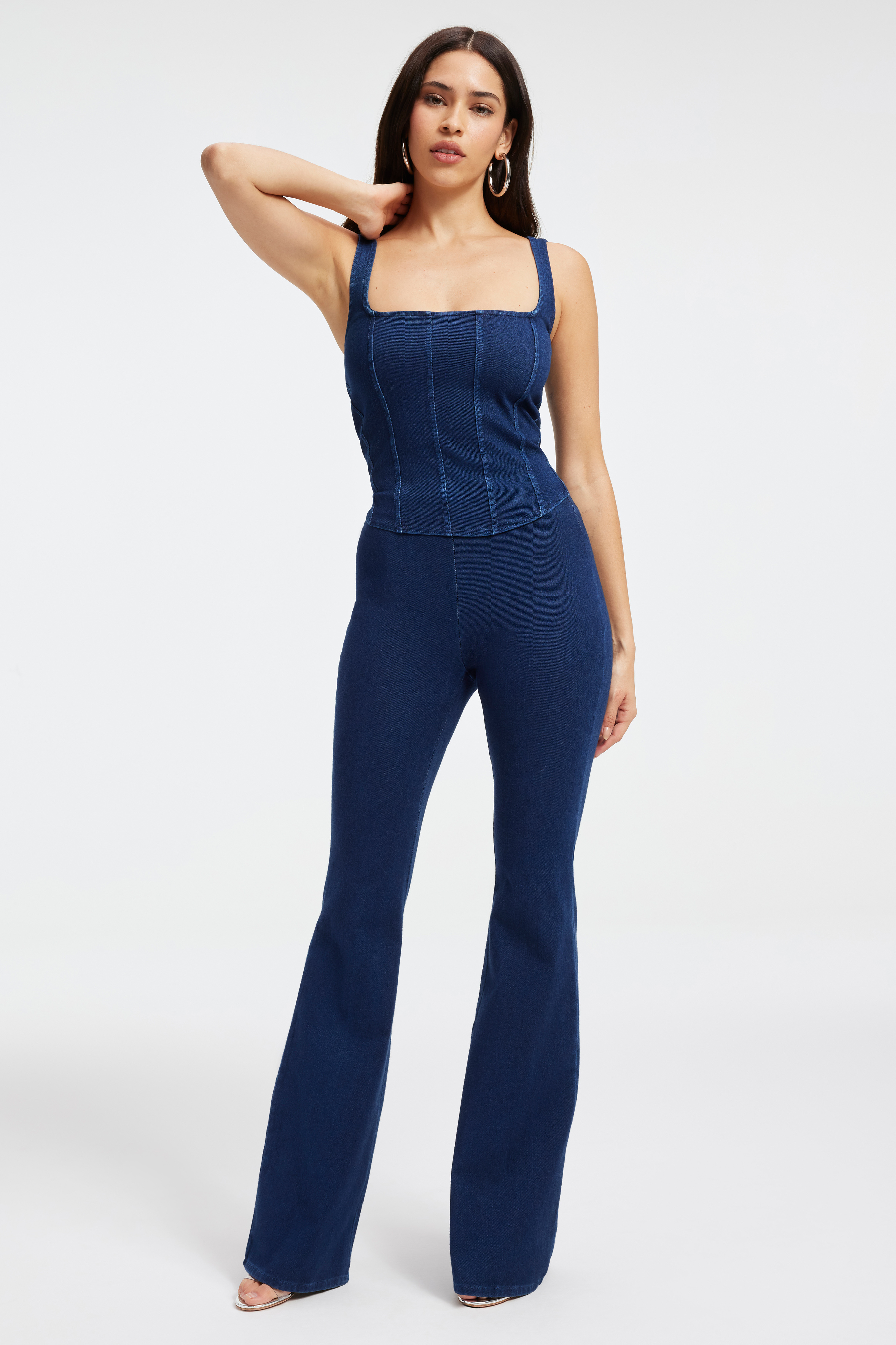 SOFT SCULPT PULL-ON FLARE JEANS in INDIGO377 styled with our SOFT SCULPT MODERN TANK BODYSUIT in INDIGO377, SOFT SCULPT CORSET TANK in INDIGO377, or JEANIUS RIBBED TANK in INDIGO377
