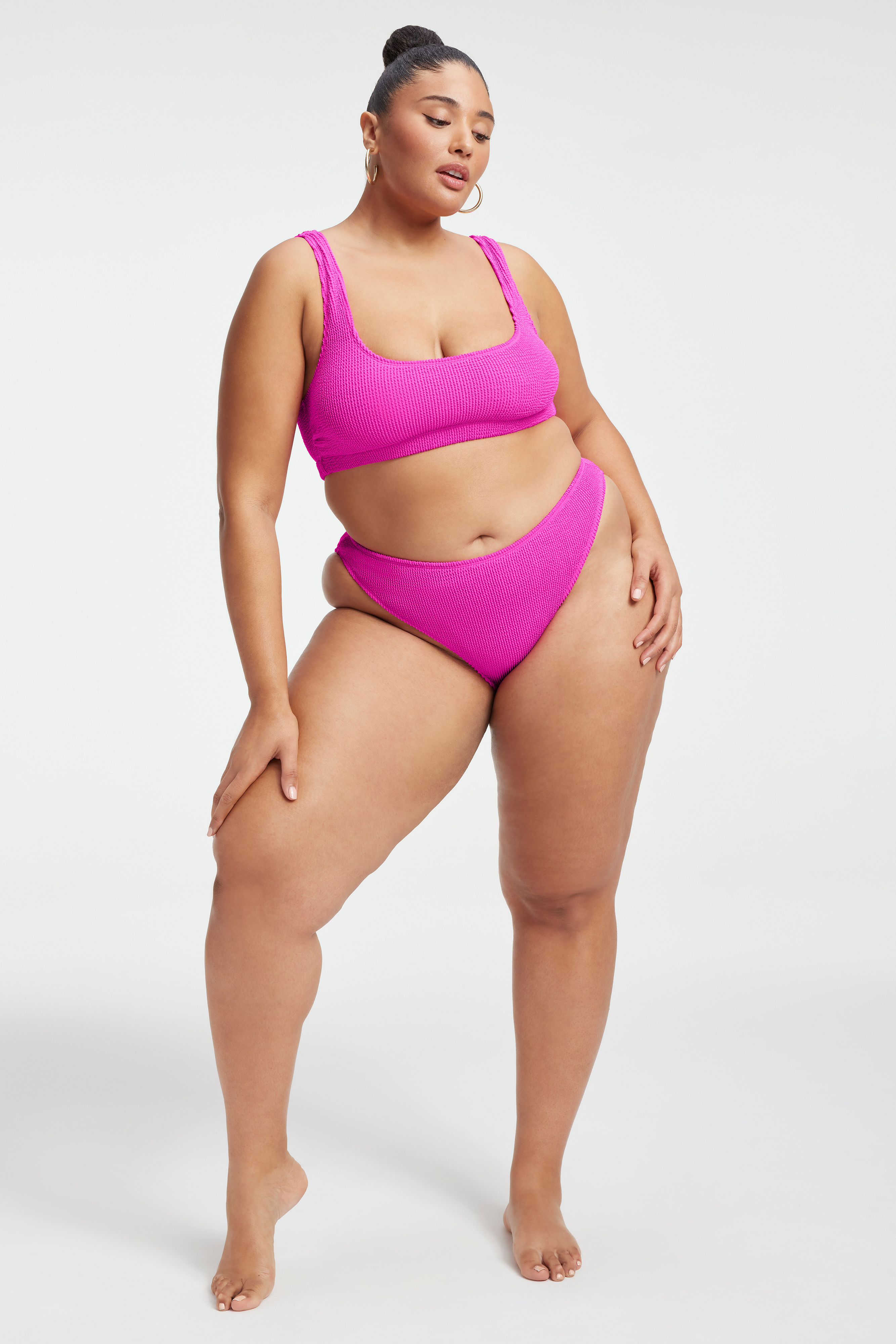 ALWAYS FITS BETTER BIKINI BOTTOM in HAWAIIAN PINK001 styled with our ALWAYS FITS SCOOP BIKINI TOP in HAWAIIAN PINK001, ALWAYS FITS SWIM BANDEAU in HAWAIIAN PINK001, or ALWAYS FITS MINI DRESS in HAWAIIAN PINK001
