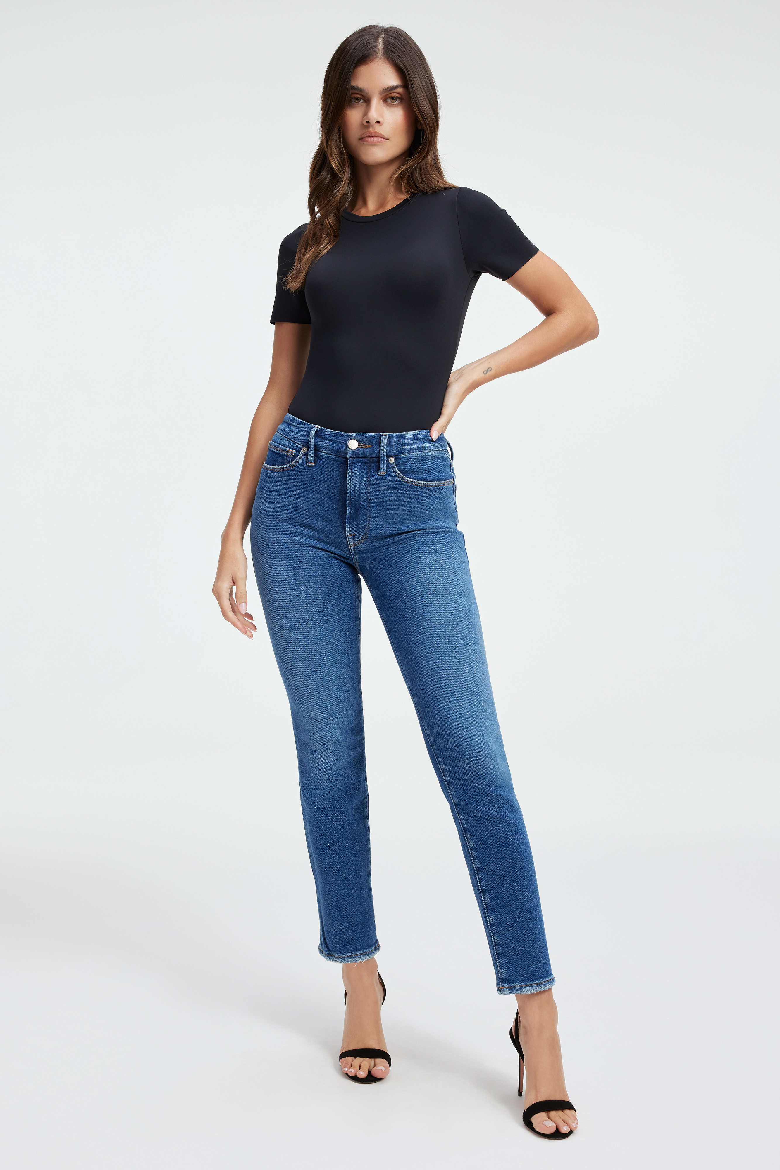 GOOD CLASSIC JEANS in INDIGO405 styled with our JEANIUS FITTED TEE in BLACK378, SCUBA FUNNEL NECK BODYSUIT in BLACK001, or GOOD TOUCH LONG SLEEVE TURTLENECK BODY in BLACK001