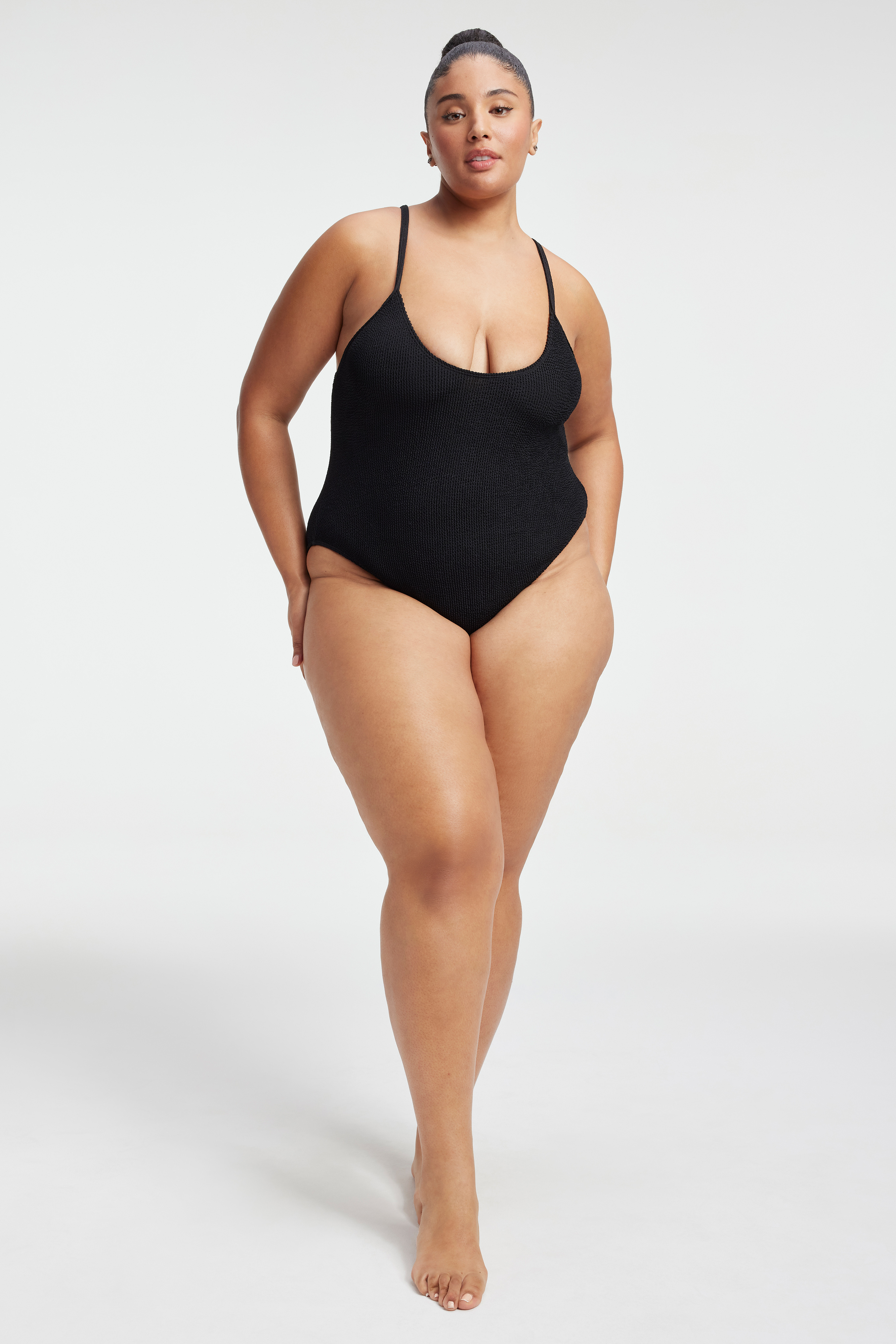 ALWAYS FITS ONE-PIECE SWIMSUIT in BLACK001 styled with our GODDESS ROBE SPARKLE in BLACK001, GODDESS ROBE in BLACK001, or ALWAYS FITS MINI SKIRT in BLACK001