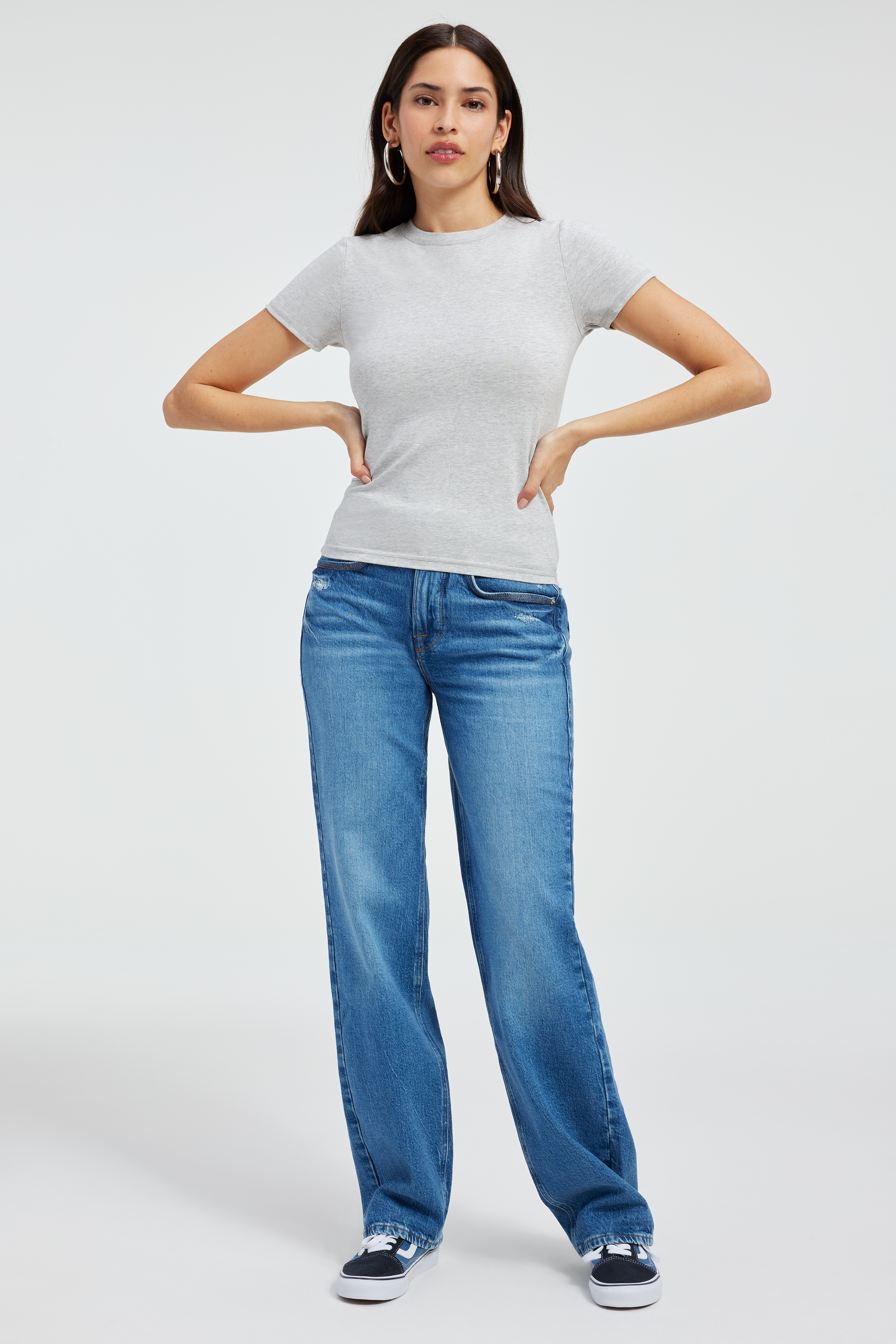 SUPER STRETCH BABY TEE in HEATHER GREY001 styled with our GOOD '90s JEANS in INDIGO348, GOOD CLASSIC BOOTCUT JEANS in INDIGO412, or GOOD LEGS STRAIGHT JEANS in INDIGO333