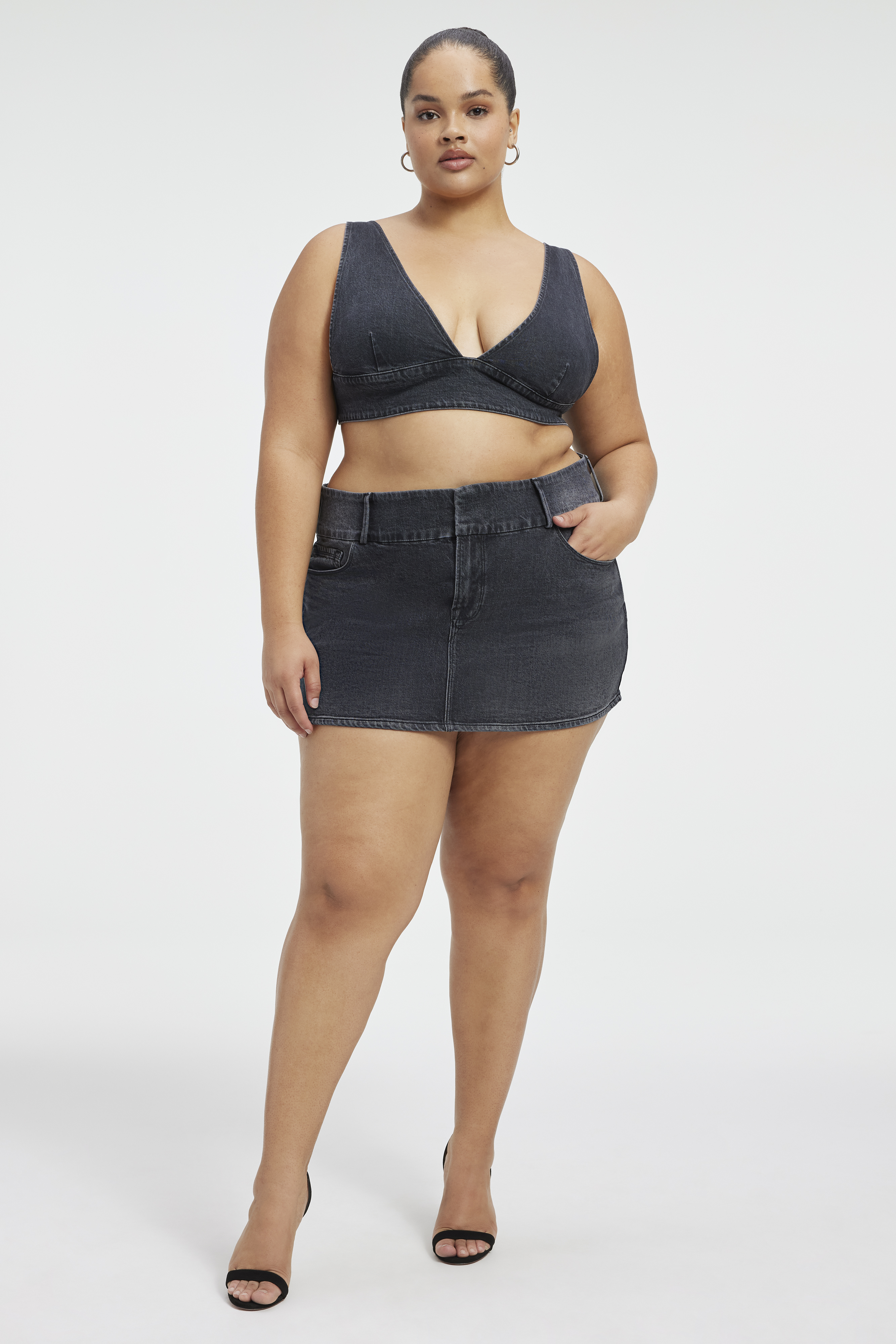 MICRO MINI SKIRT in BLACK250 styled with our DENIM BRA in BLACK250, OVERSIZED SHACKET in BLACK250, or COTTON CROPPED LONG SLEEVE in BLACK001