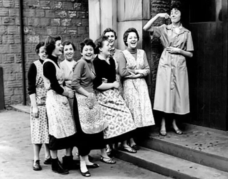 Group of female workers outside of Phoenox Textiles in the 1950s