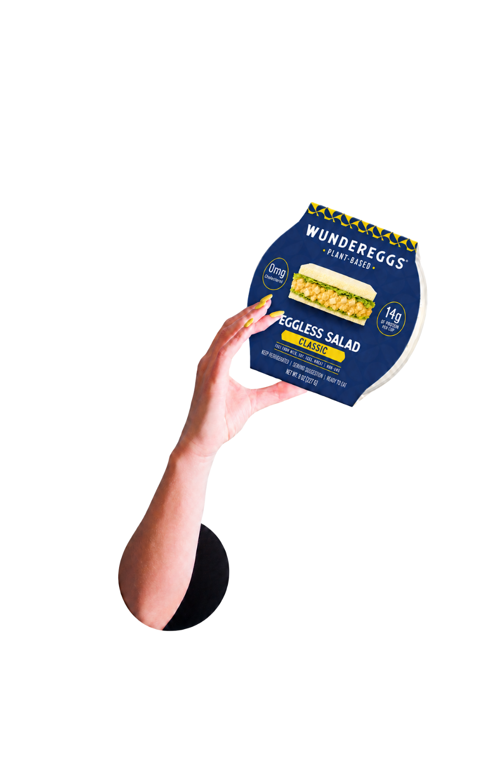 Hand holding package of Wundereggs Plant-Based Eggless Salad