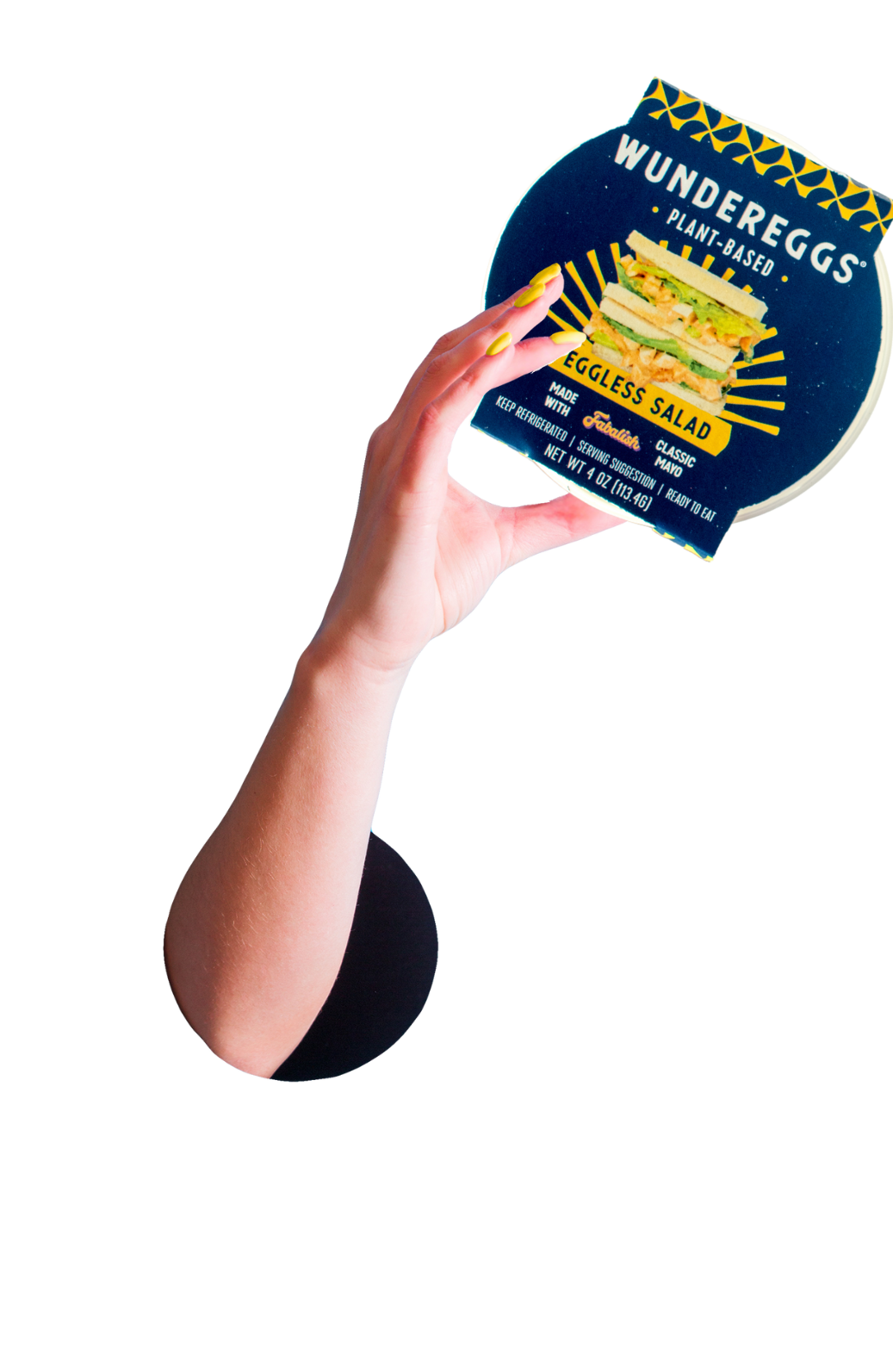 Hand holding package of Wundereggs Plant Based Eggless Salad