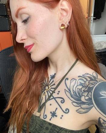 Tattooed  girl wearing cool Gold Steel Lobe Cuff, Small