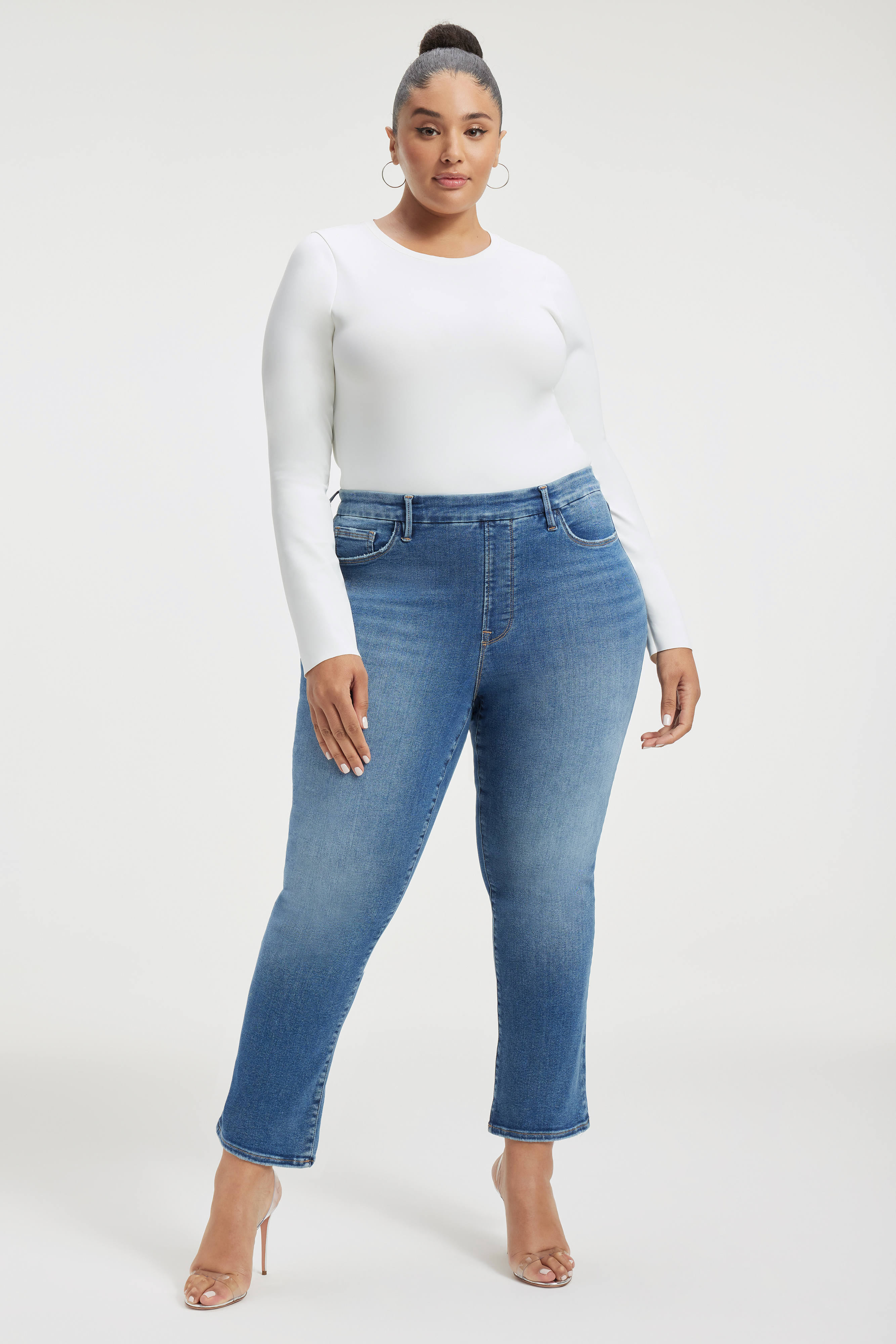 POWER STRETCH PULL-ON STRAIGHT JEANS in INDIGO490 styled with our SCUBA CREW BODYSUIT in WHITE001, SCUBA TEE BODYSUIT in WHITE001, or COTTON CROPPED LONG SLEEVE in WHITE001
