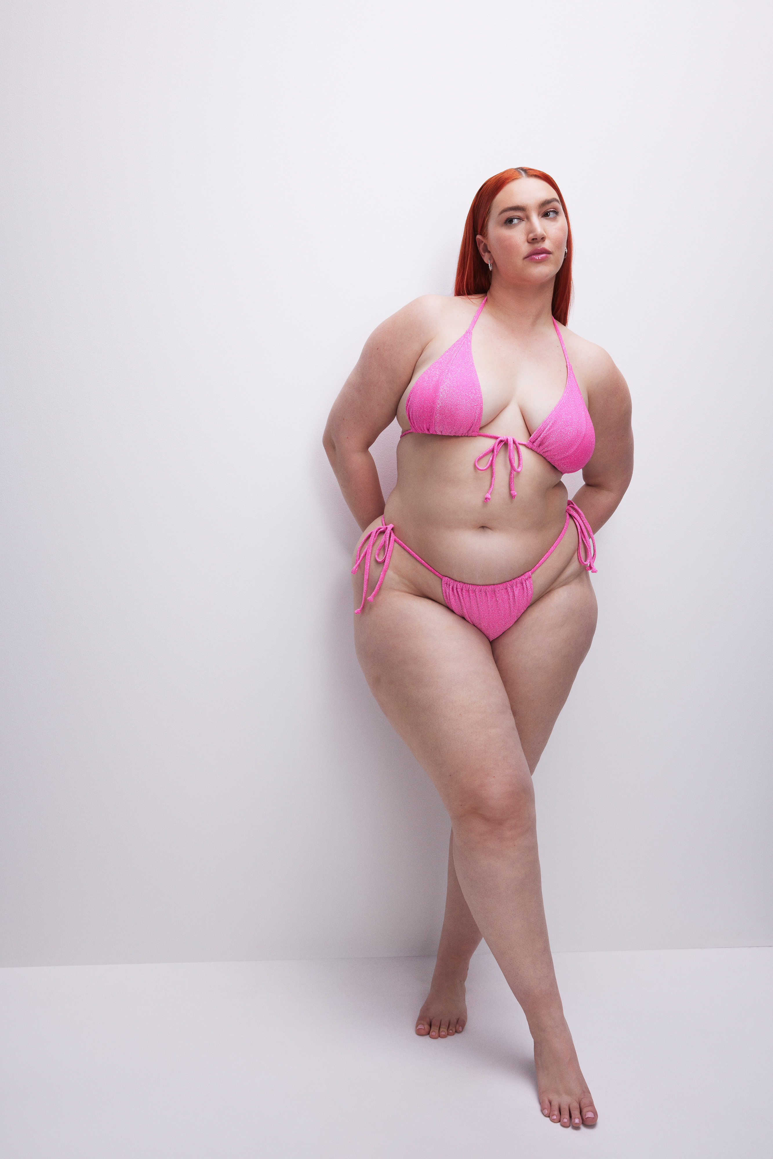 SPARKLE TINY TIES BIKINI BOTTOM in KNOCKOUTPINK001 styled with our SPARKLE TINY TIES BIKINI TOP in KNOCKOUTPINK001, SPARKLE DEMI CUP BIKINI TOP in KNOCKOUTPINK001, or SPARKLE SCOOP BIKINI TOP in KNOCKOUTPINK001