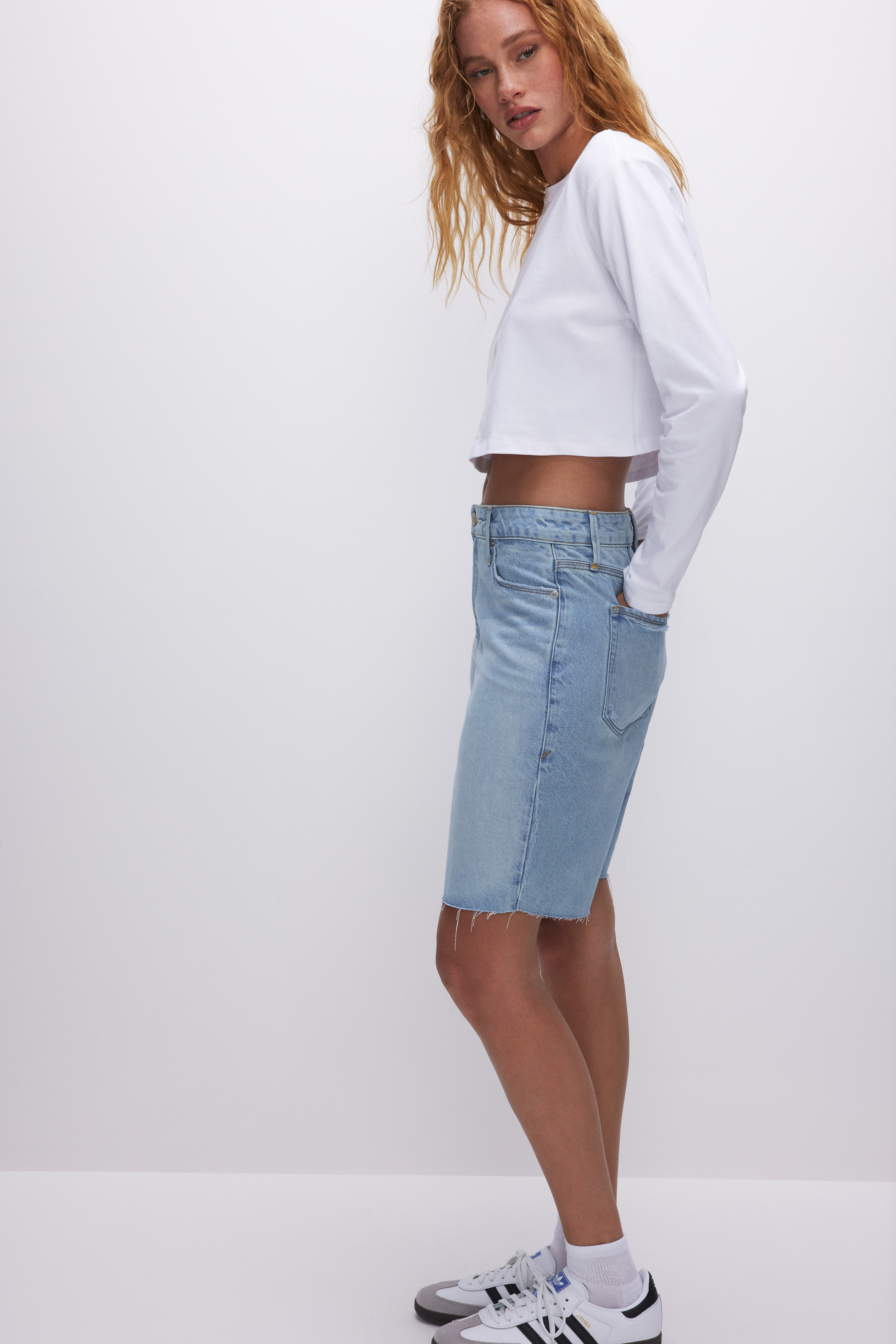GOOD '90s BERMUDA SHORTS in INDIGO473 styled with our COTTON CROPPED LONG SLEEVE in WHITE001, COTTON CROPPED TEE in WHITE001, or SUPER STRETCH BABY TEE in WHITE001