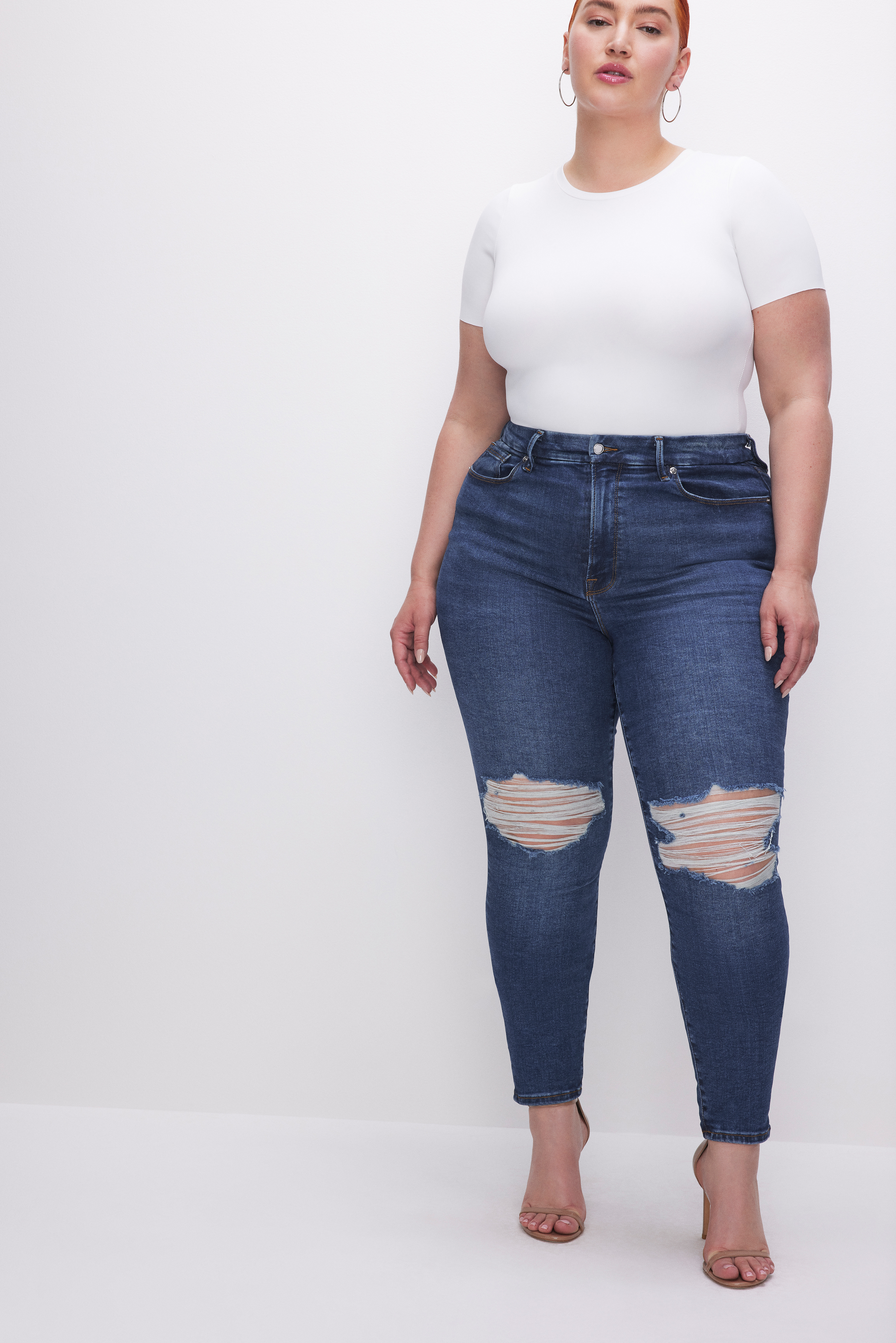 ALWAYS FITS GOOD LEGS SKINNY JEANS in INDIGO450 styled with our SCUBA TEE BODYSUIT in WHITE001, SCUBA CREW BODYSUIT in WHITE001, or SUPER STRETCH BABY TEE in WHITE001