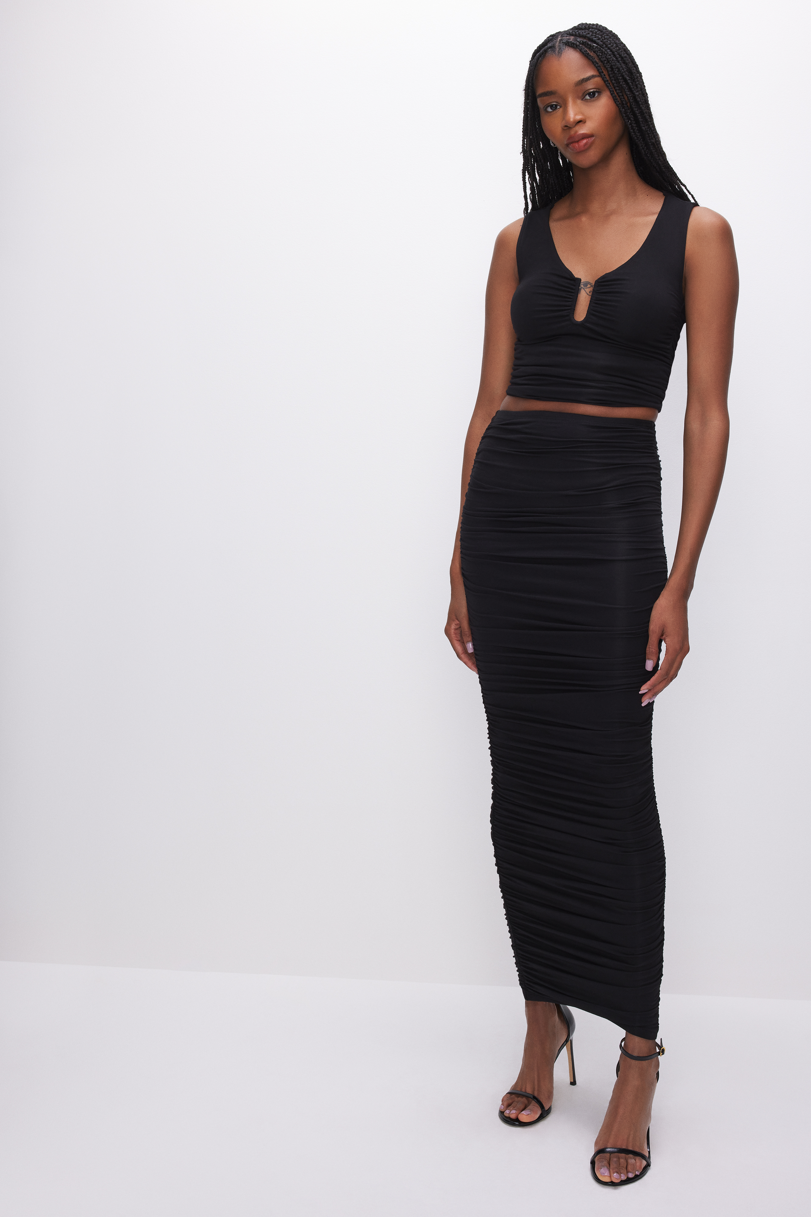 SUPER STRETCH MAXI SKIRT in BLACK001 styled with our SLINKY JERSEY U BAR TANK TOP in BLACK001, SCULPTED TEE in BLACK001, or COTTON CROPPED TEE in BLACK001