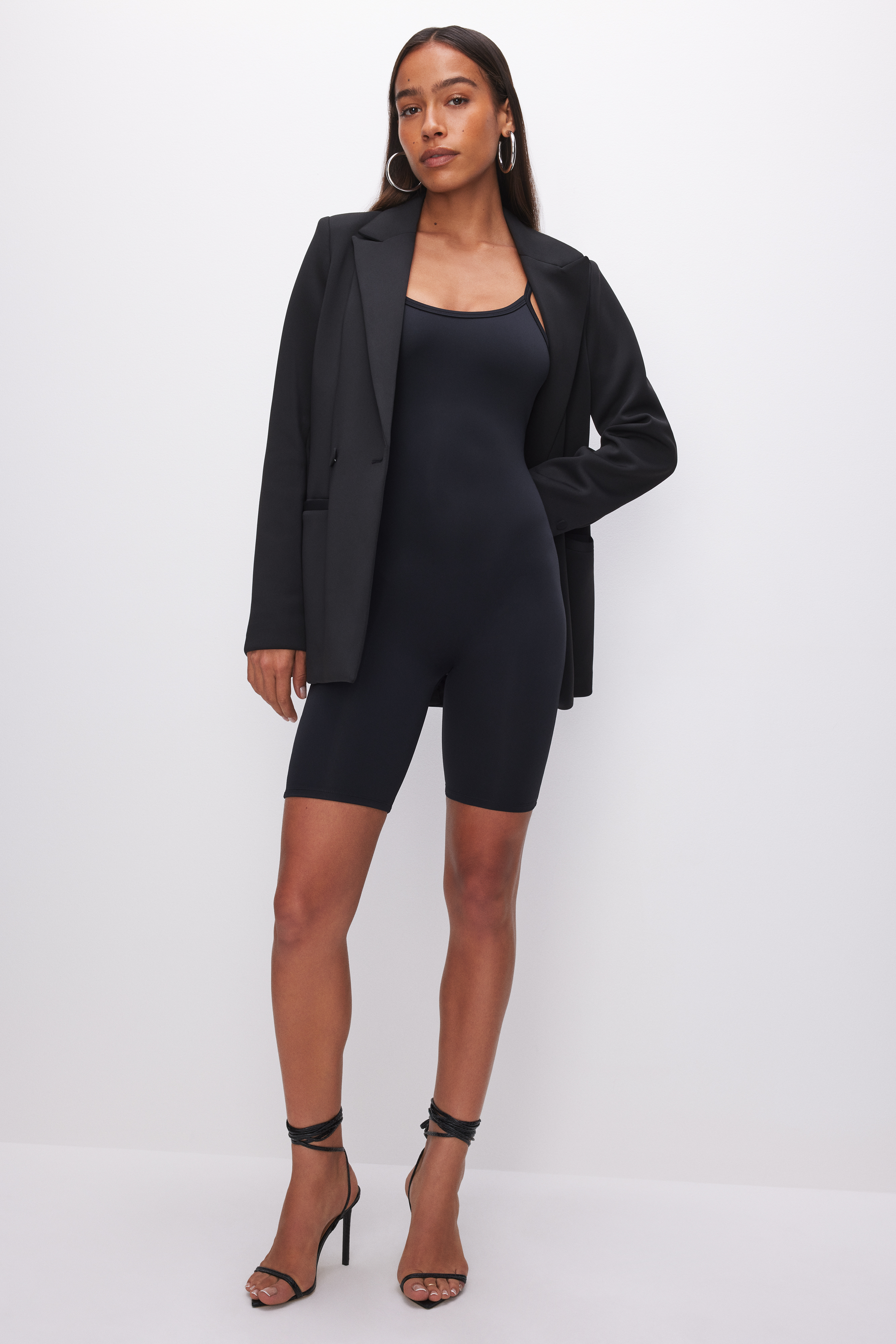 SCUBA BIKER CATSUIT in BLACK001 styled with our SCUBA BLAZER 2.0 in BLACK001, WOVEN BLAZER in BLACK001, or CINDER-F*CKING-RELLA PUMP in LIGHT SMOKE001