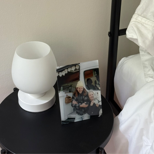 Glass print couple on night stand