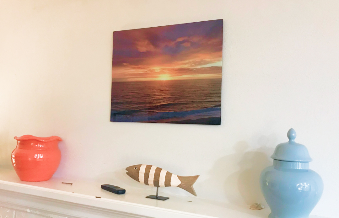 Two Framed Pictures on Wall